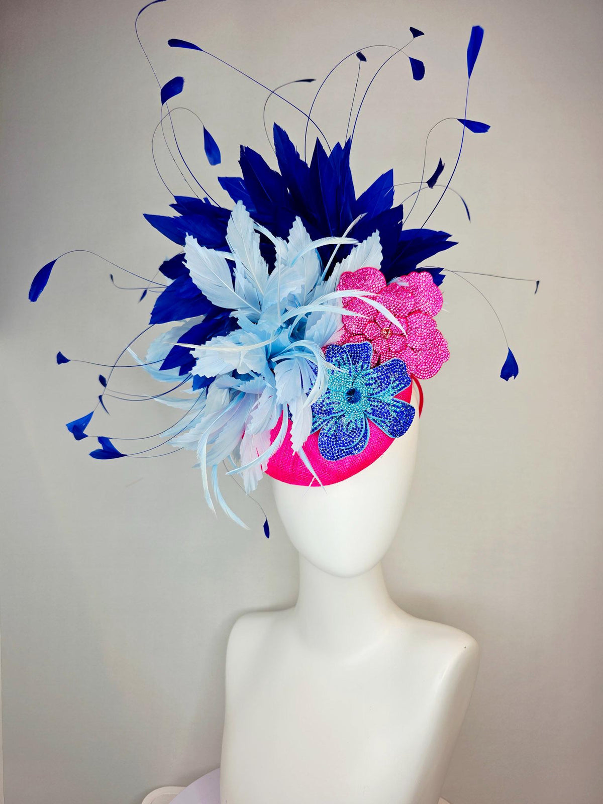 kentucky derby hat fascinator hot pink sinamay with pink and blue crystal rhinestone flowers and fluffy light blue royal navy blue feathers