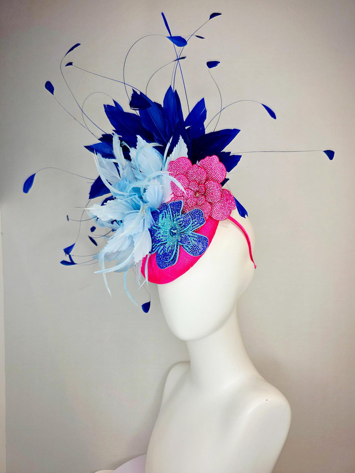 kentucky derby hat fascinator hot pink sinamay with pink and blue crystal rhinestone flowers and fluffy light blue royal navy blue feathers
