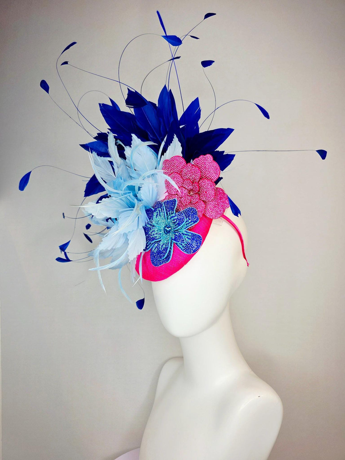kentucky derby hat fascinator hot pink sinamay with pink and blue crystal rhinestone flowers and fluffy light blue royal navy blue feathers