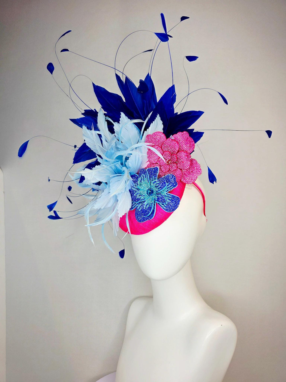 kentucky derby hat fascinator hot pink sinamay with pink and blue crystal rhinestone flowers and fluffy light blue royal navy blue feathers