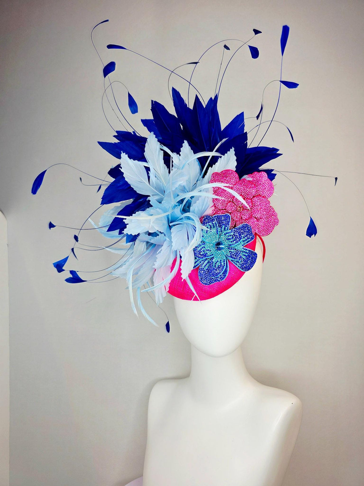 kentucky derby hat fascinator hot pink sinamay with pink and blue crystal rhinestone flowers and fluffy light blue royal navy blue feathers