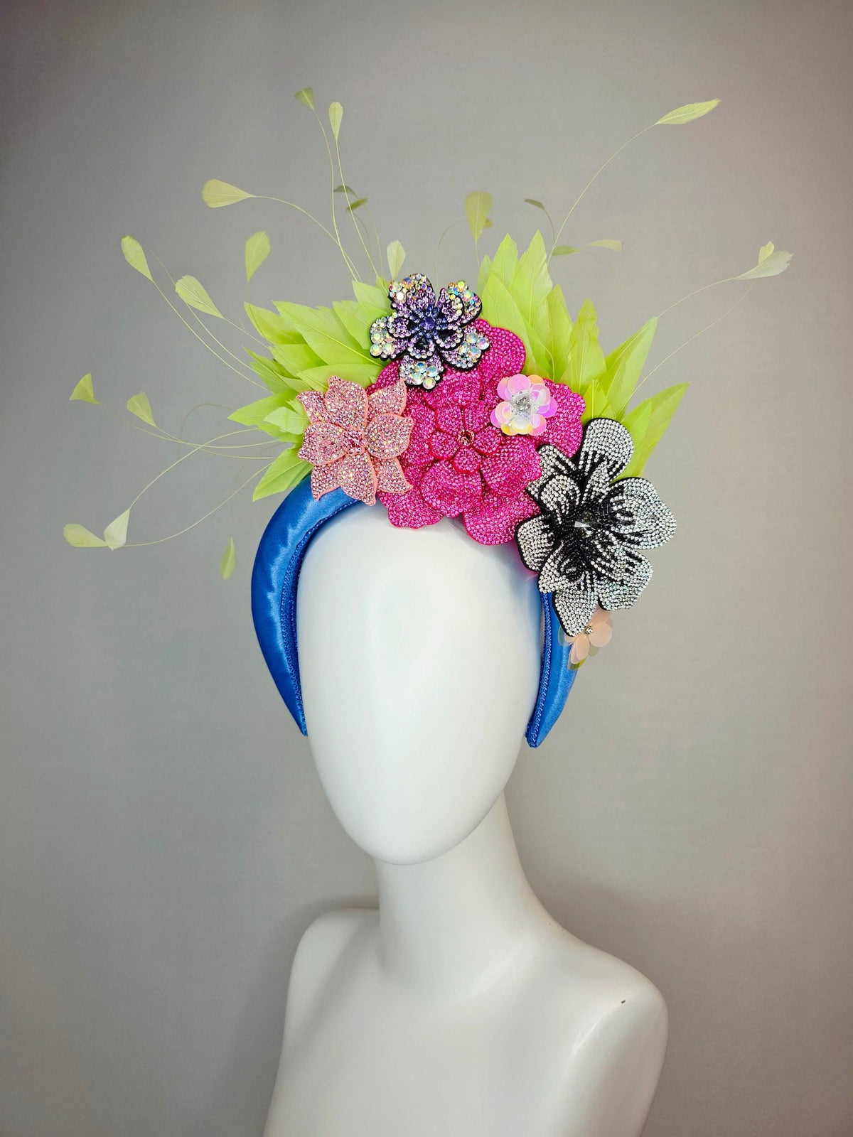 kentucky derby hat fascinator cobalt blue satin headband with silver black pink iridescent pink purple crystal flowers lime green feathers