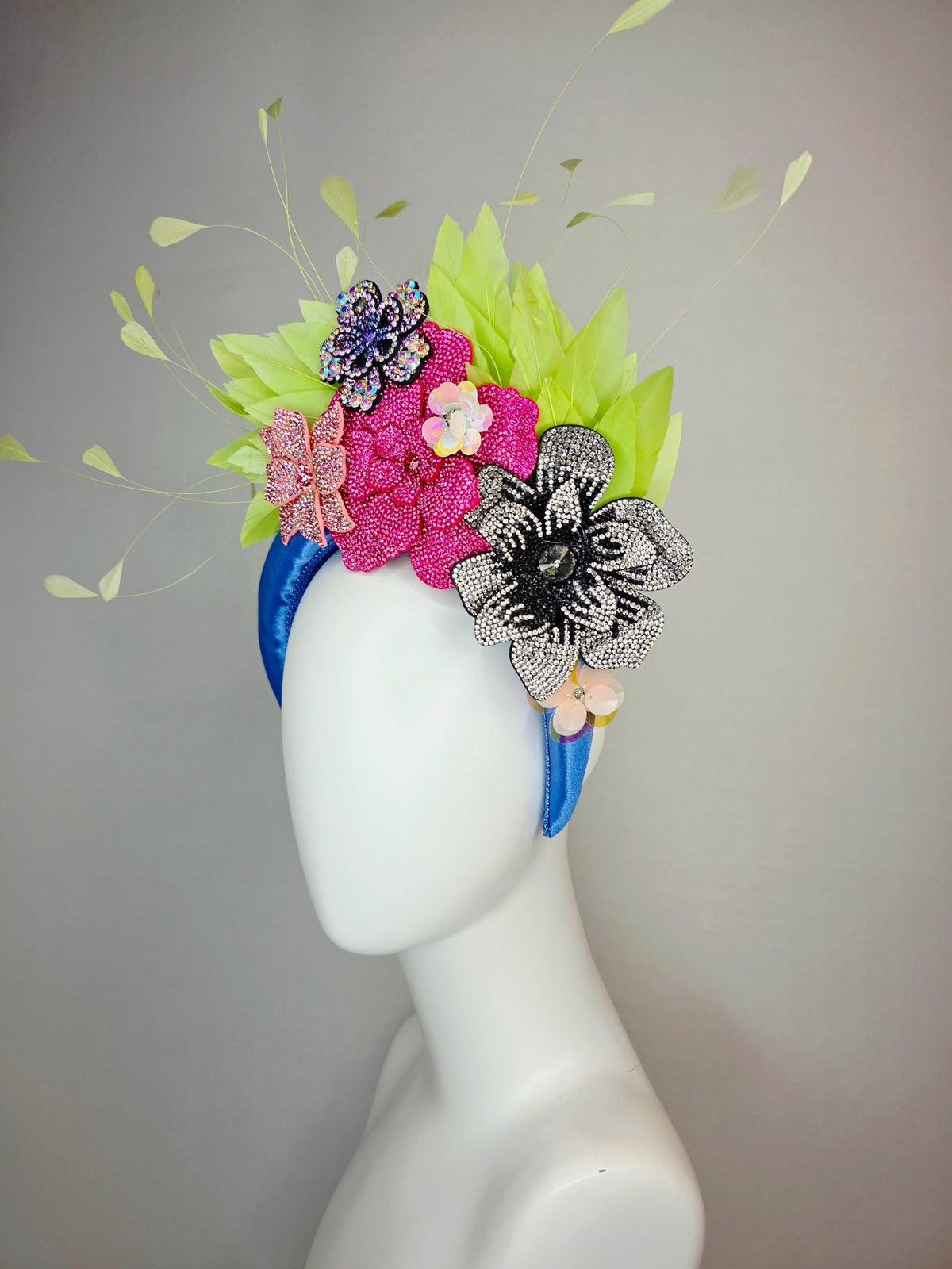 kentucky derby hat fascinator cobalt blue satin headband with silver black pink iridescent pink purple crystal flowers lime green feathers