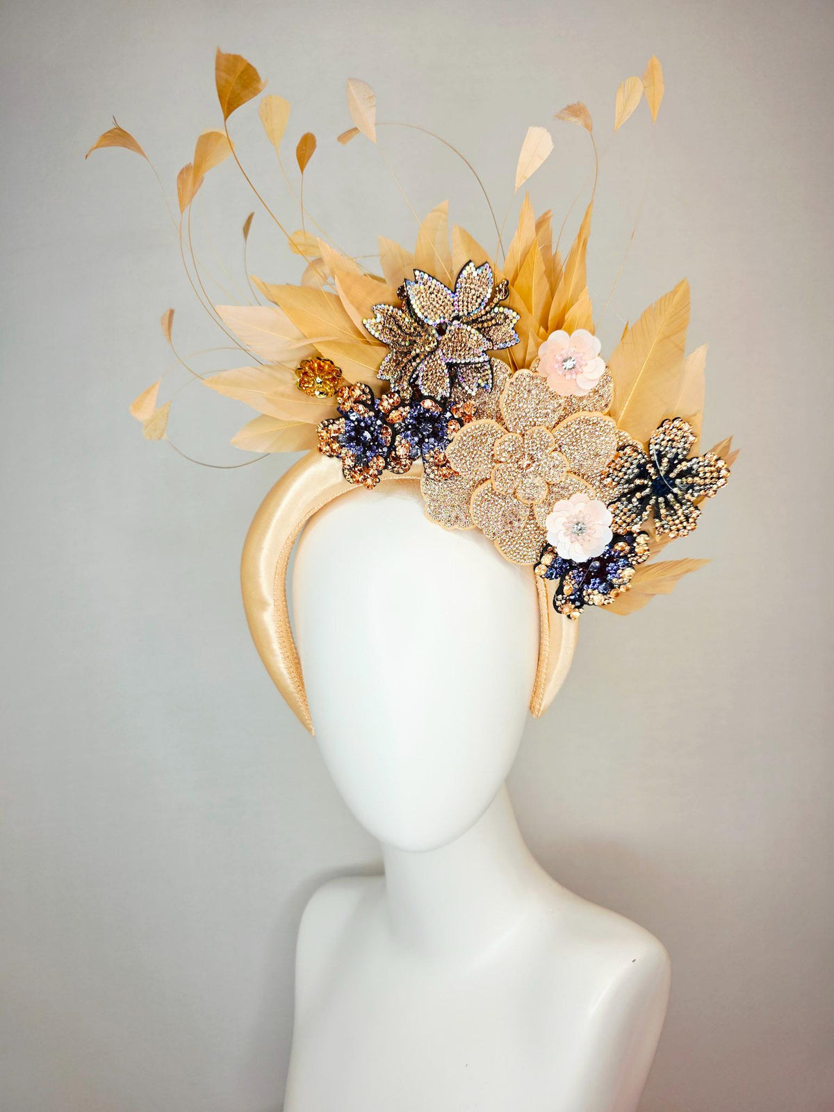 kentucky derby hat fascinator champagne gold satin headband with navy blue gold ivory crystal rhinestone flowers and tan beige gold feathers