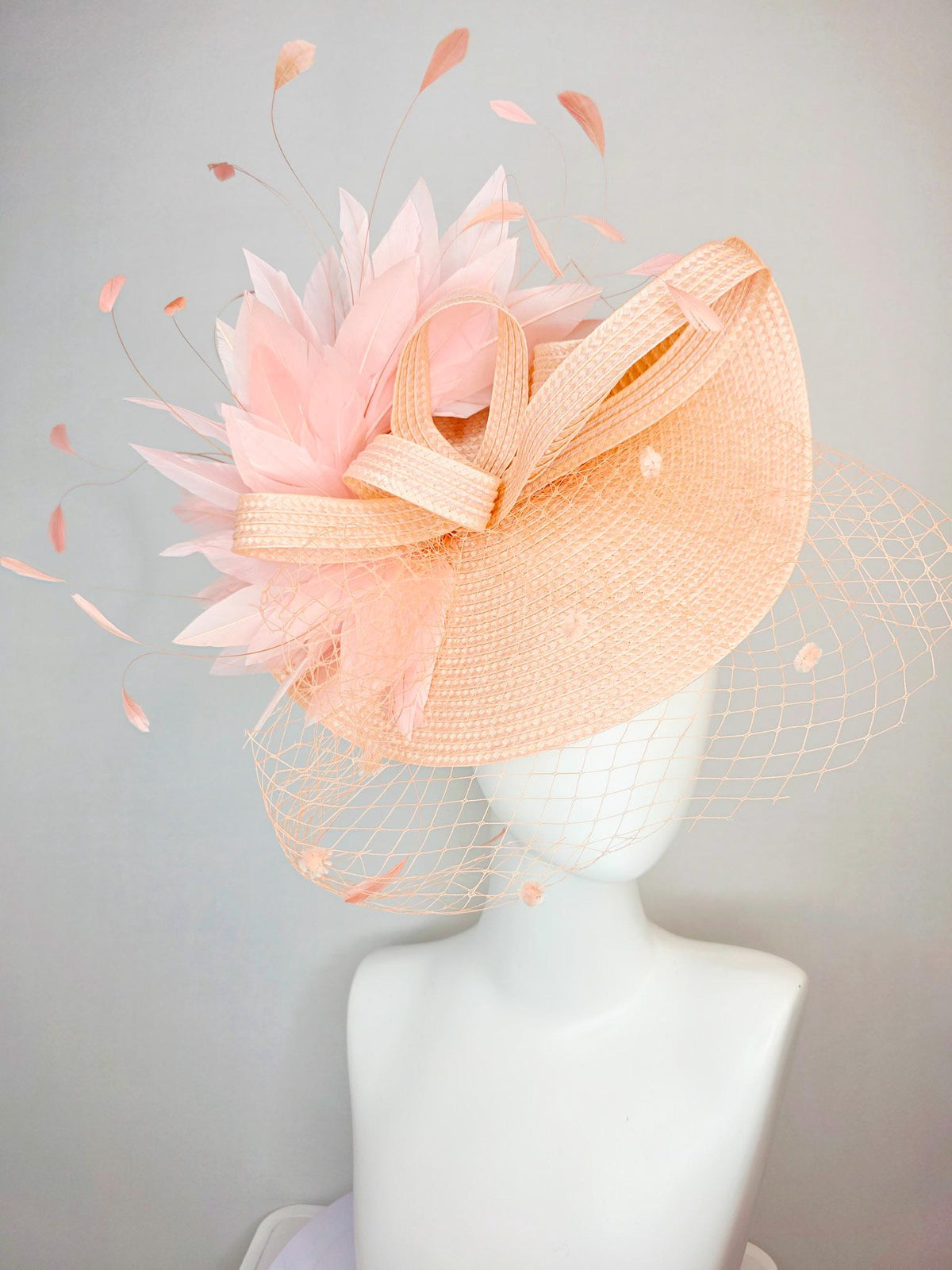 kentucky derby hat fascinator neutral champagne beige straw saucer with champagne straw bow light baby pink feathers and champagne mesh veil