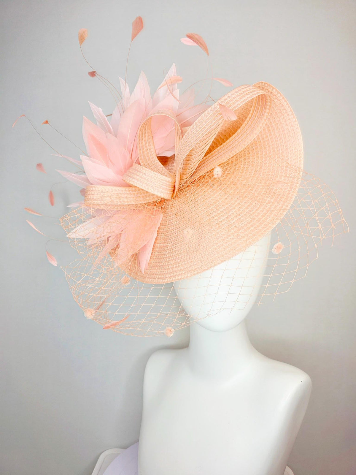 kentucky derby hat fascinator neutral champagne beige straw saucer with champagne straw bow light baby pink feathers and champagne mesh veil