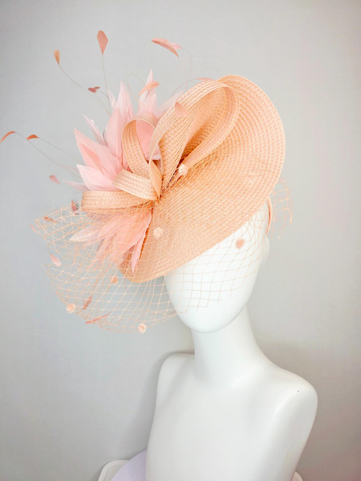 kentucky derby hat fascinator neutral champagne beige straw saucer with champagne straw bow light baby pink feathers and champagne mesh veil