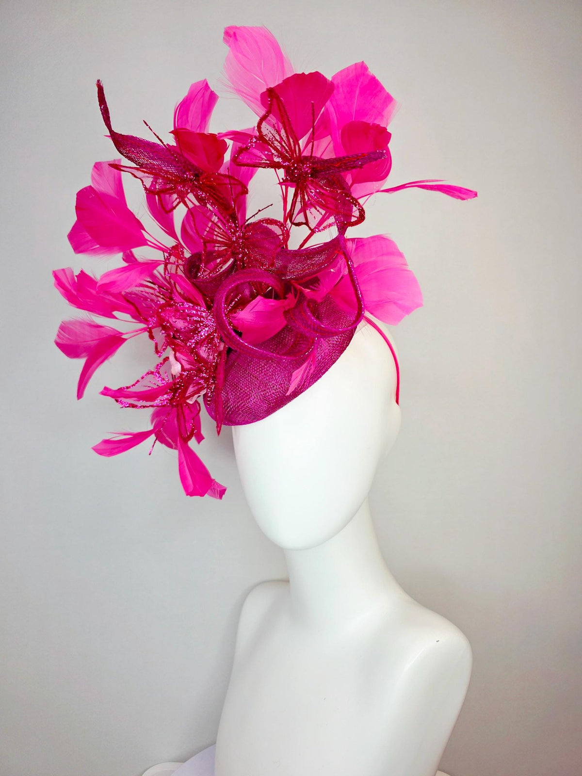 kentucky derby hat fascinator magenta pink sinamay with curls pink ombre satin flowers fuchsia pink feathers hot pink glitter butterflies