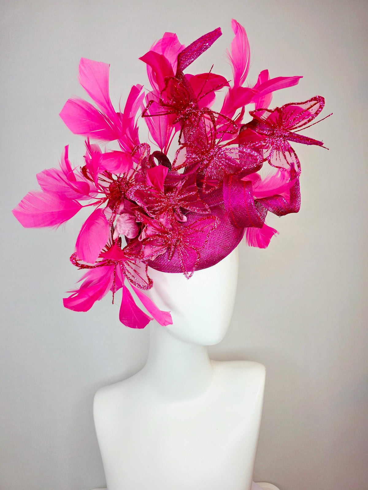 kentucky derby hat fascinator magenta pink sinamay with curls pink ombre satin flowers fuchsia pink feathers hot pink glitter butterflies