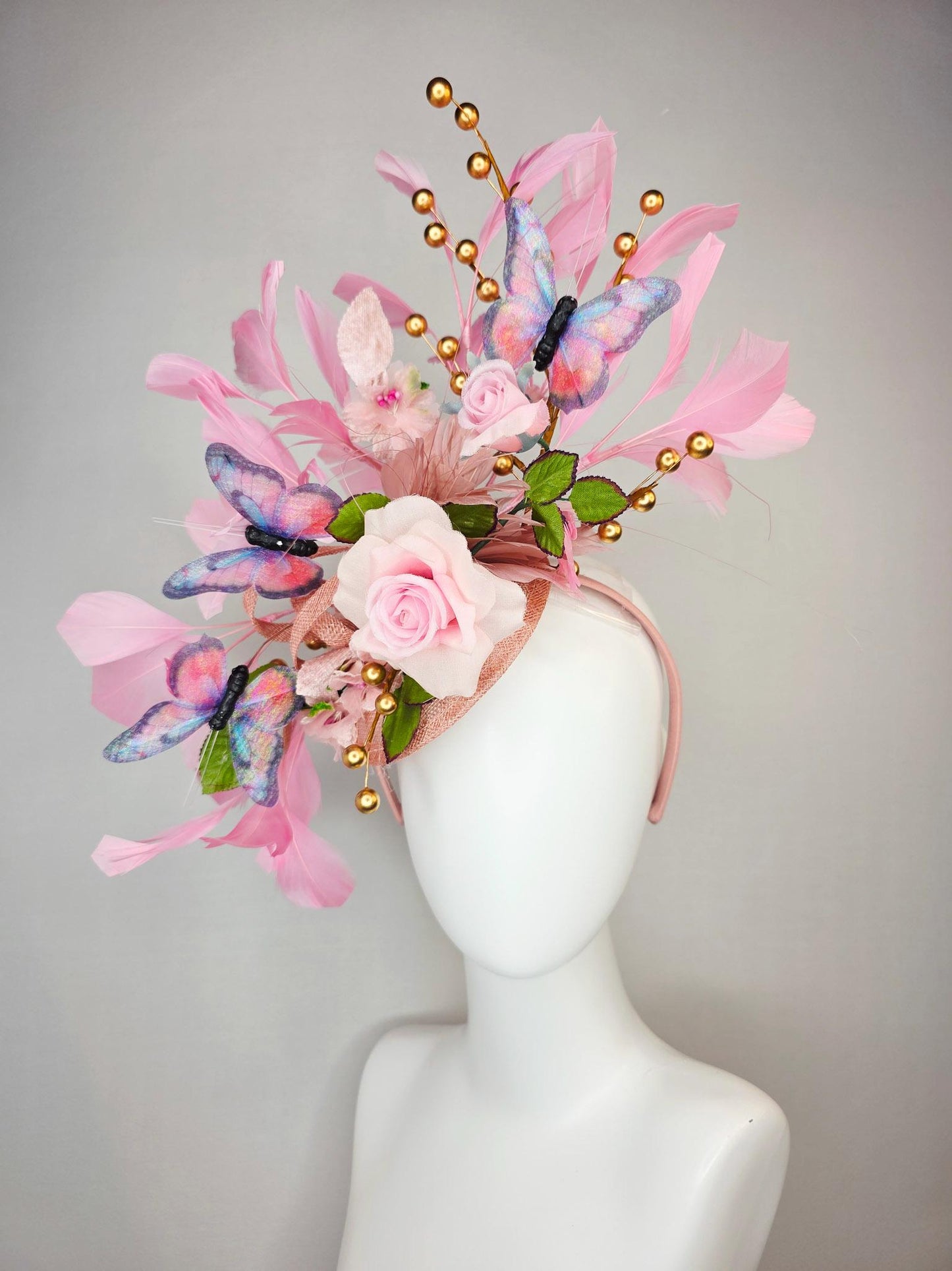 kentucky derby hat fascinator light pink satin rose green leaves dusty rose and baby blush pink feathers gold pearls pink blue butterflies