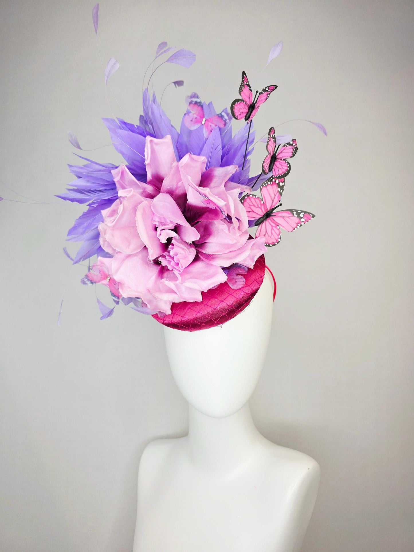 kentucky derby hat fascinator pink satin with netting large lilac purple satin flower lavender purple feathers and pink butterflies