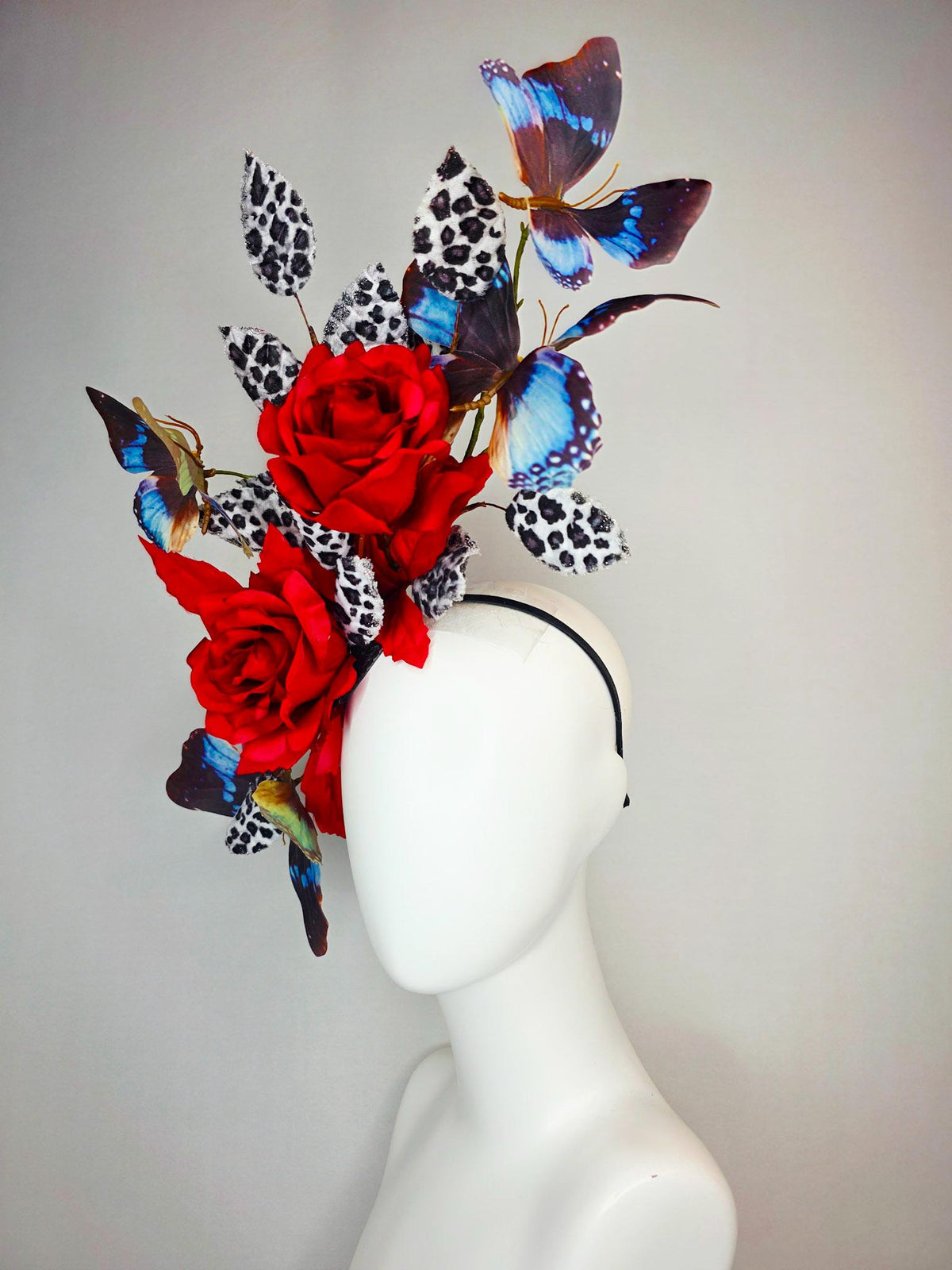 kentucky derby hat fascinator large scarlet red satin roses gray black and white leopard print velvet leaves sky blue and black butterflies
