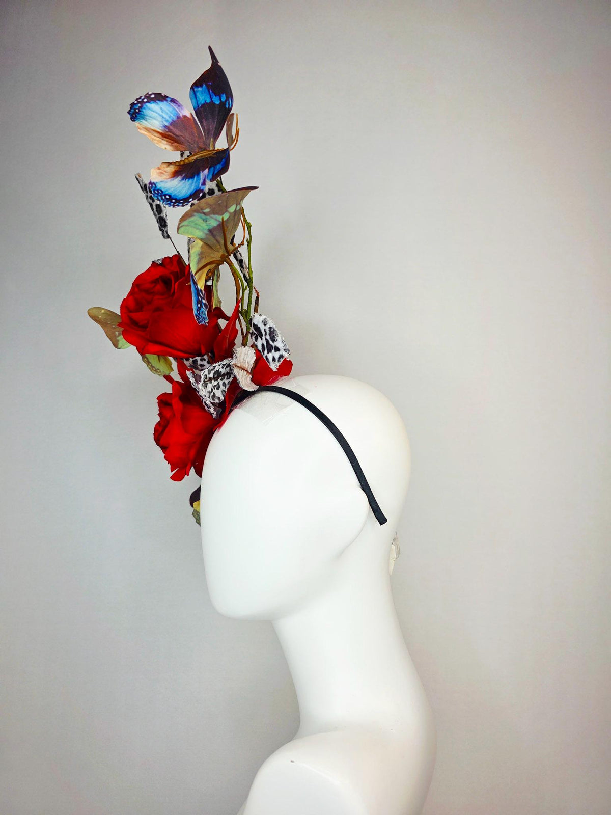 kentucky derby hat fascinator large scarlet red satin roses gray black and white leopard print velvet leaves sky blue and black butterflies