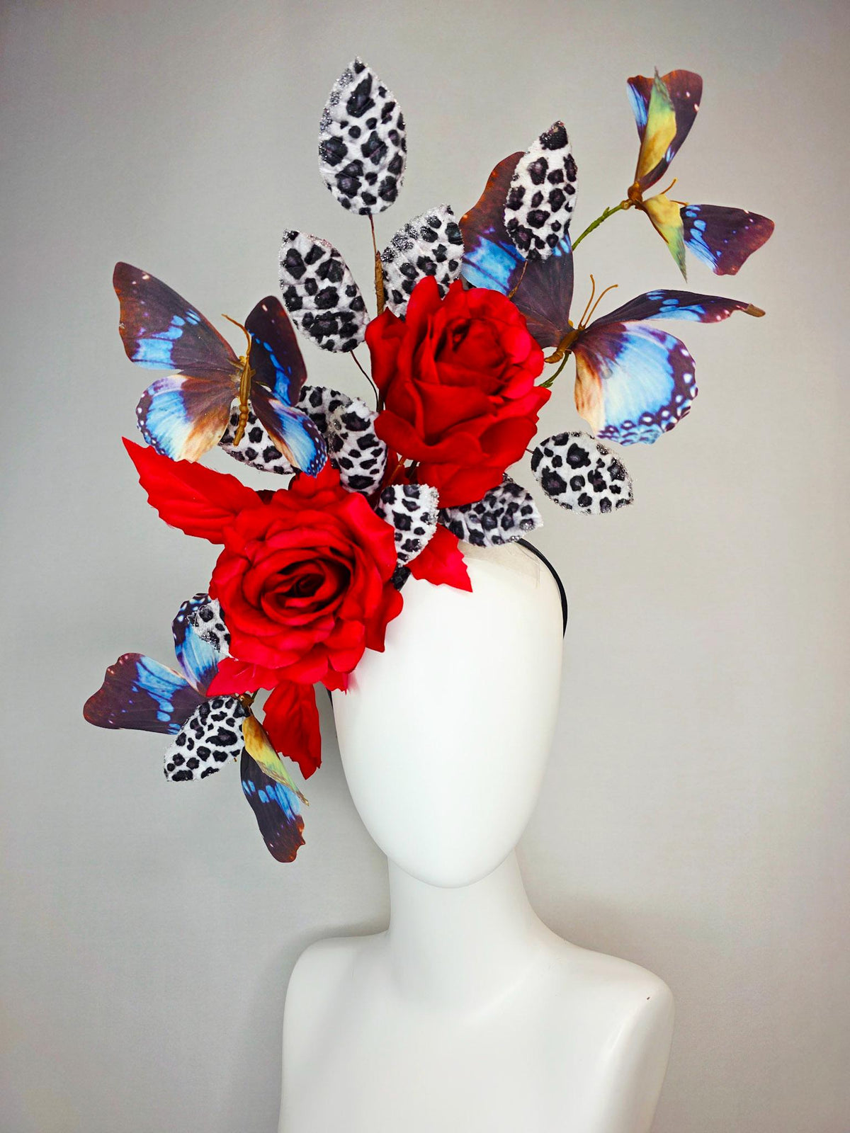 kentucky derby hat fascinator large scarlet red satin roses gray black and white leopard print velvet leaves sky blue and black butterflies