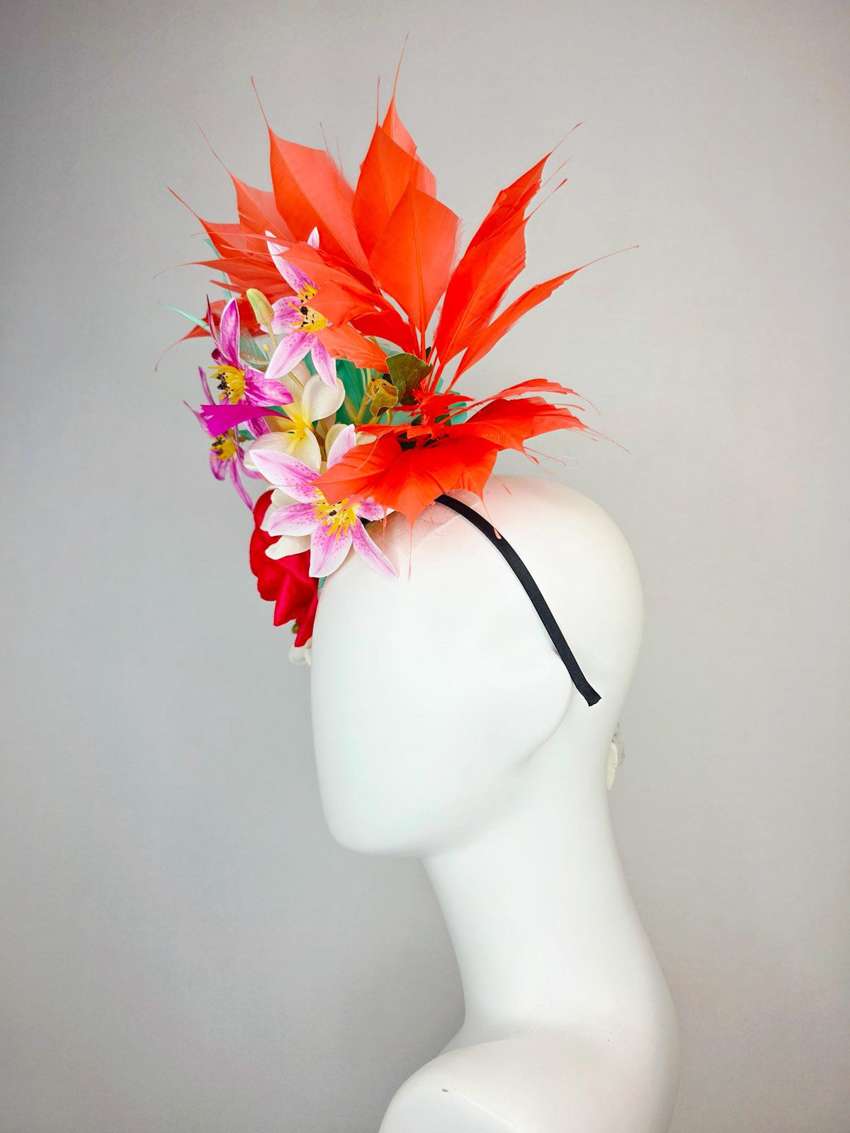 kentucky derby hat fascinator red satin rose orange ivory white pink blue satin flowers green leaves coral red and aqua mint green feathers