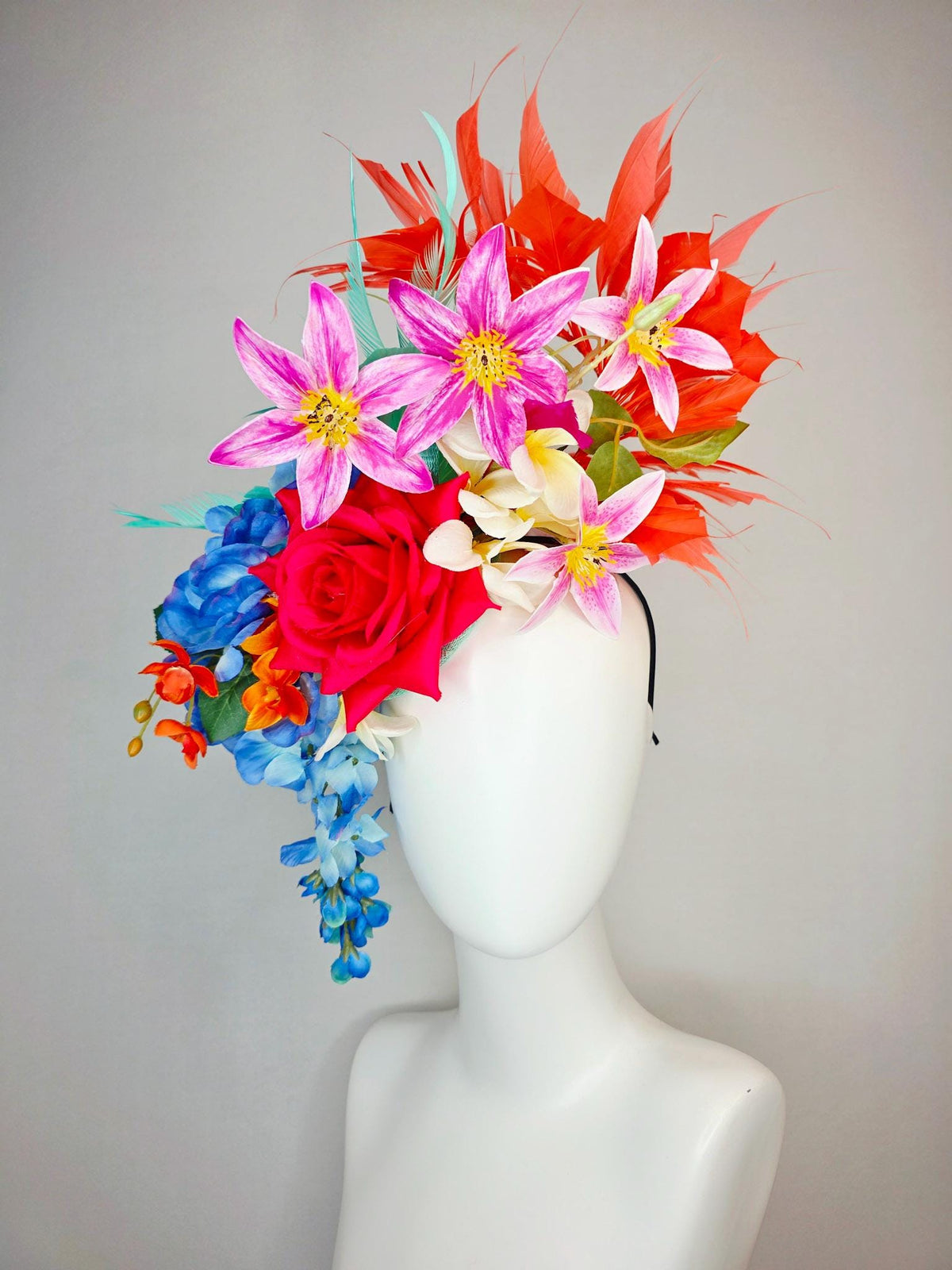 kentucky derby hat fascinator red satin rose orange ivory white pink blue satin flowers green leaves coral red and aqua mint green feathers