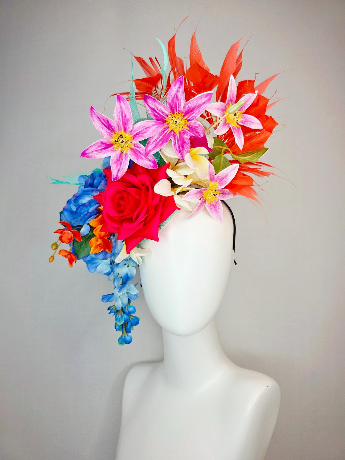 kentucky derby hat fascinator red satin rose orange ivory white pink blue satin flowers green leaves coral red and aqua mint green feathers