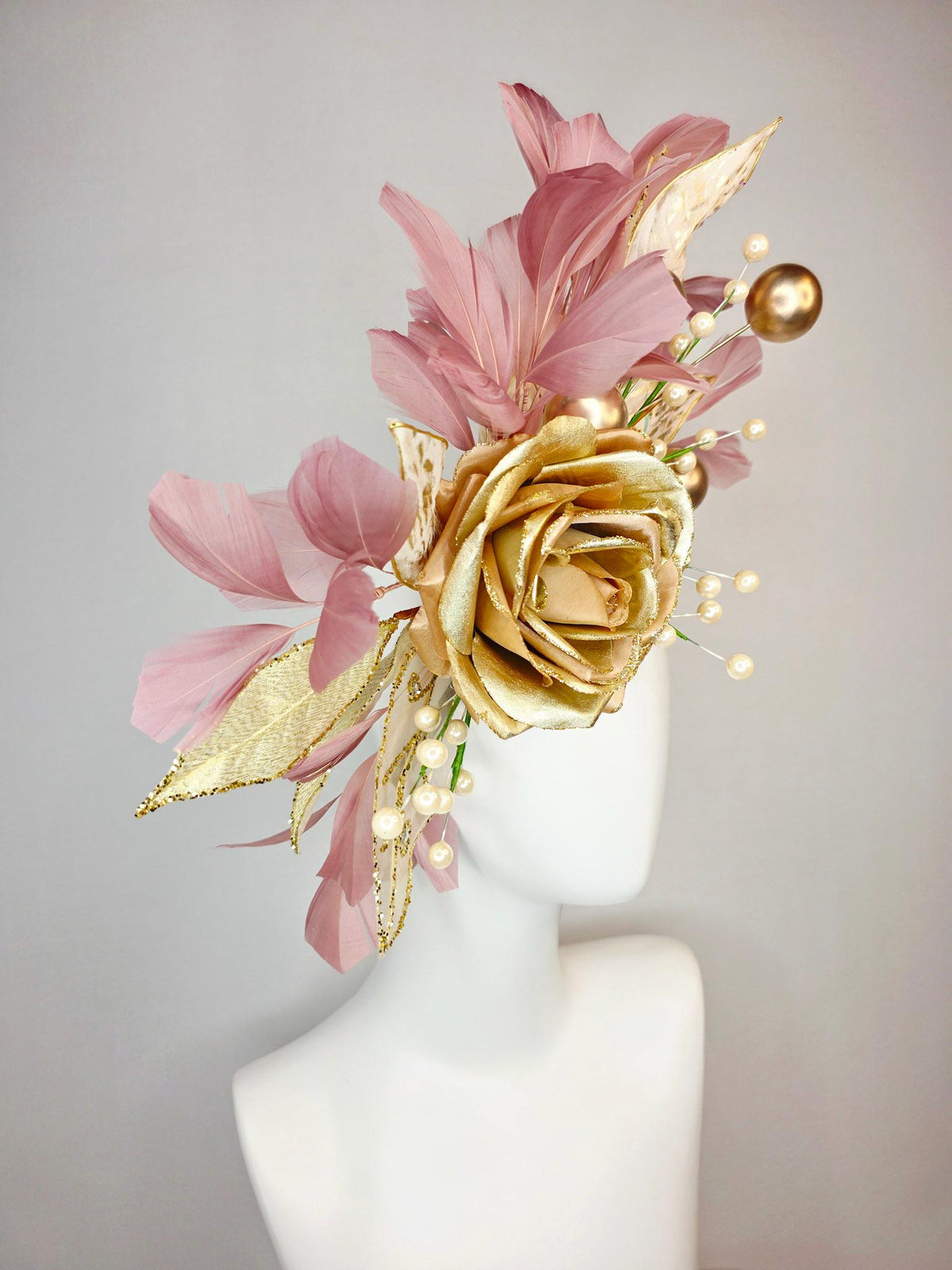 kentucky derby hat fascinator large gold satin silk rose with gold leaves large gold and small pearls mauve dusty pink branching feathers
