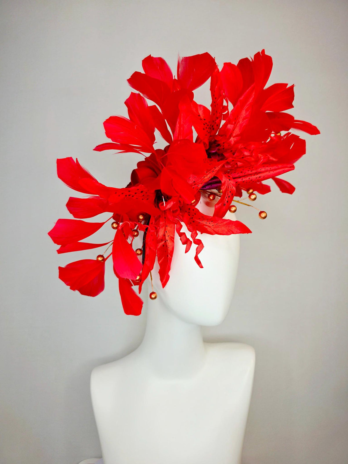 kentucky derby hat fascinator bright scarlet red satin lily flowers with gold pearls and bright red branching feathers