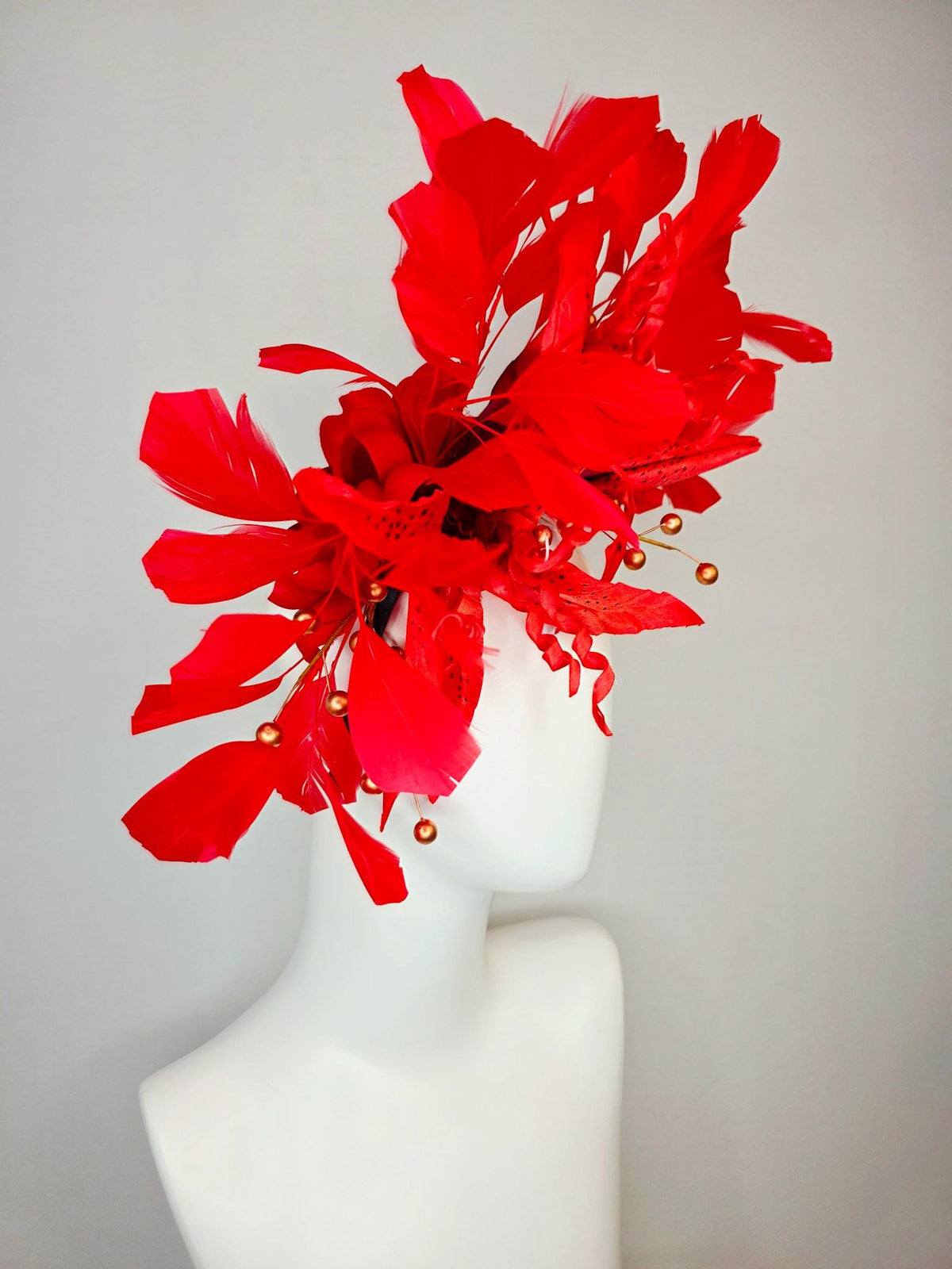 kentucky derby hat fascinator bright scarlet red satin lily flowers with gold pearls and bright red branching feathers