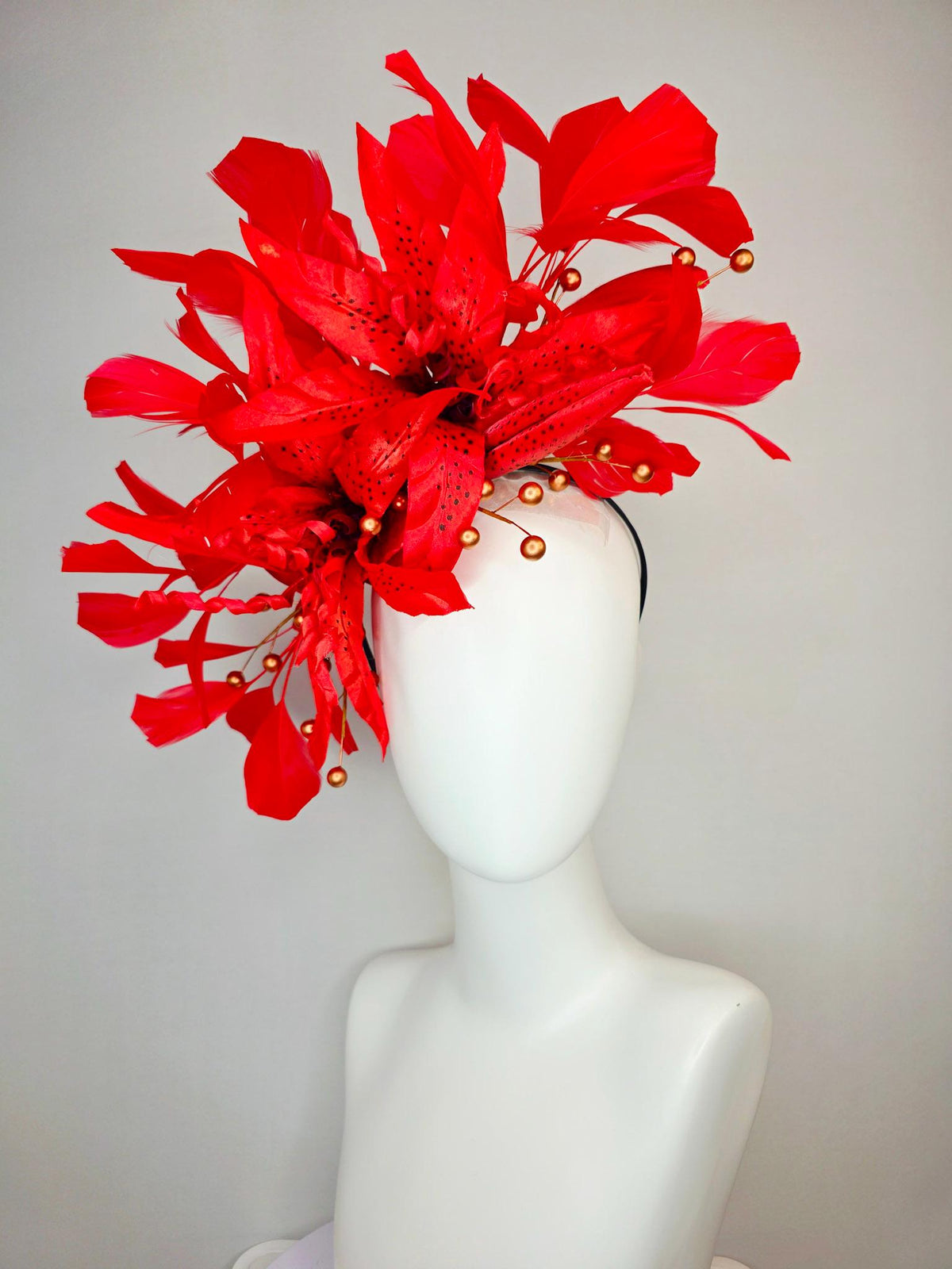 kentucky derby hat fascinator bright scarlet red satin lily flowers with gold pearls and bright red branching feathers