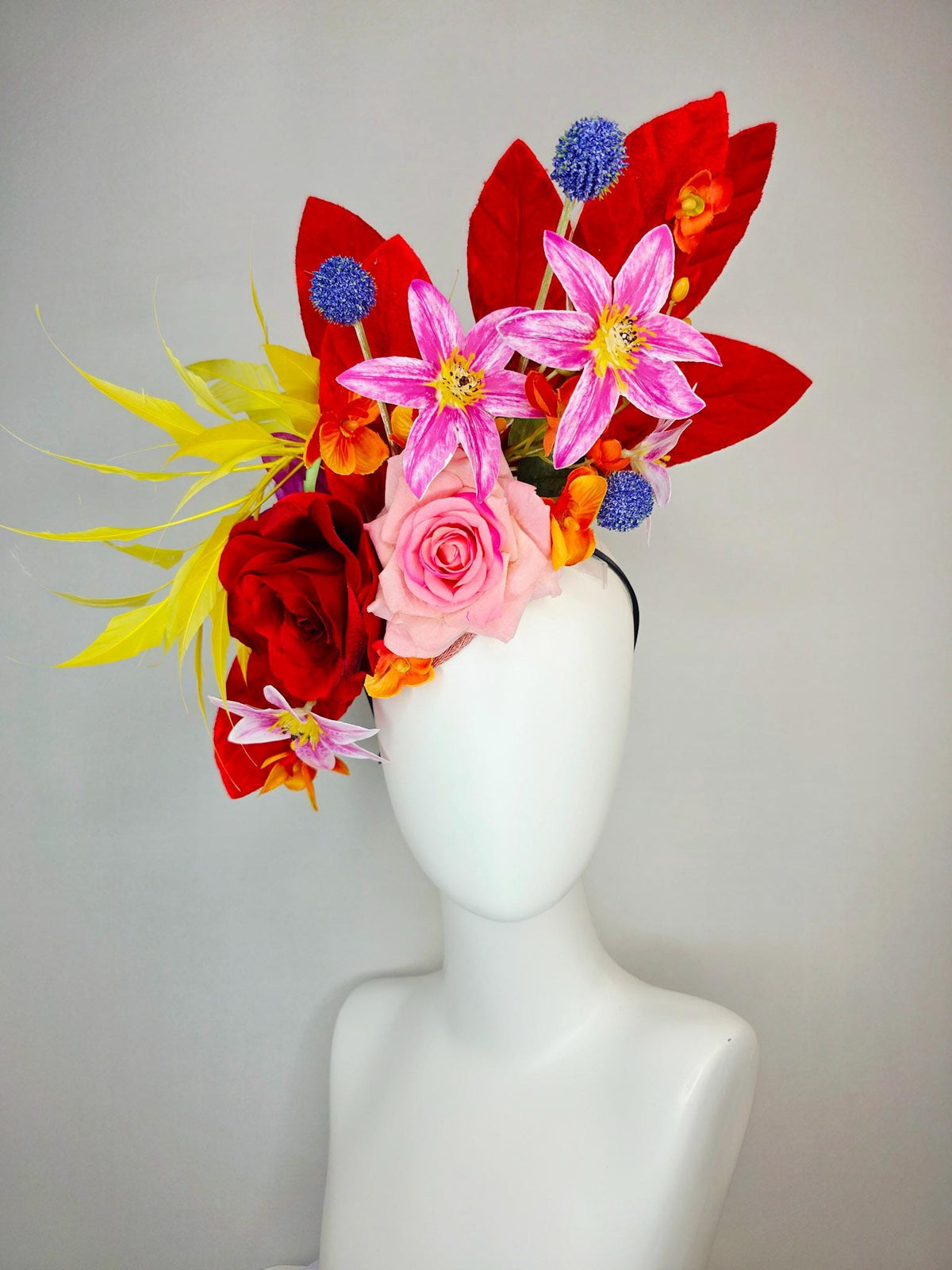 kentucky derby hat fascinator red light pink satin roses orange red pink magenta purple flowers blue thistle red leaves and yellow feathers