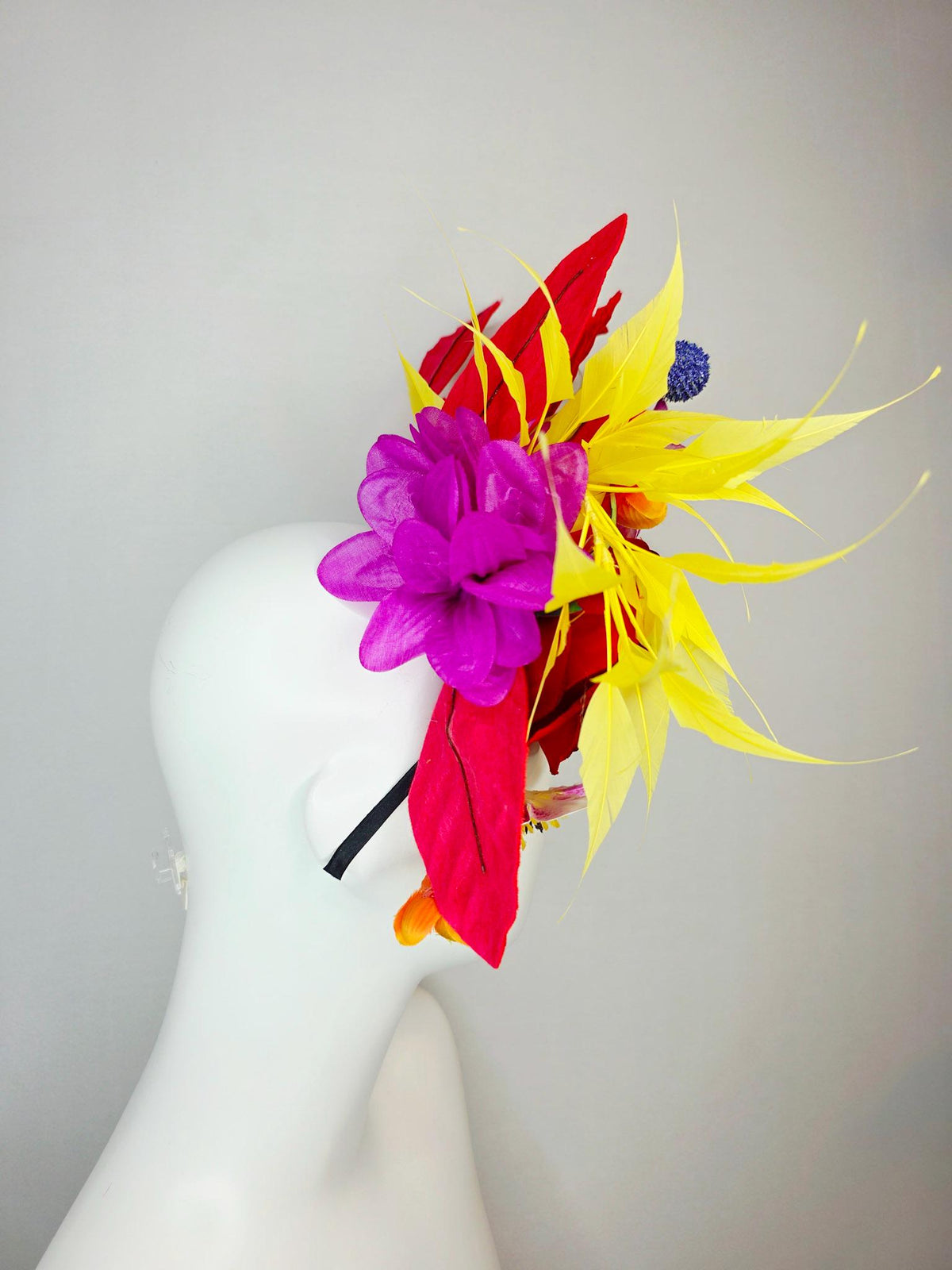 kentucky derby hat fascinator red light pink satin roses orange red pink magenta purple flowers blue thistle red leaves and yellow feathers