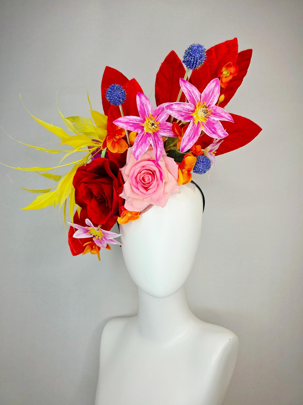 kentucky derby hat fascinator red light pink satin roses orange red pink magenta purple flowers blue thistle red leaves and yellow feathers