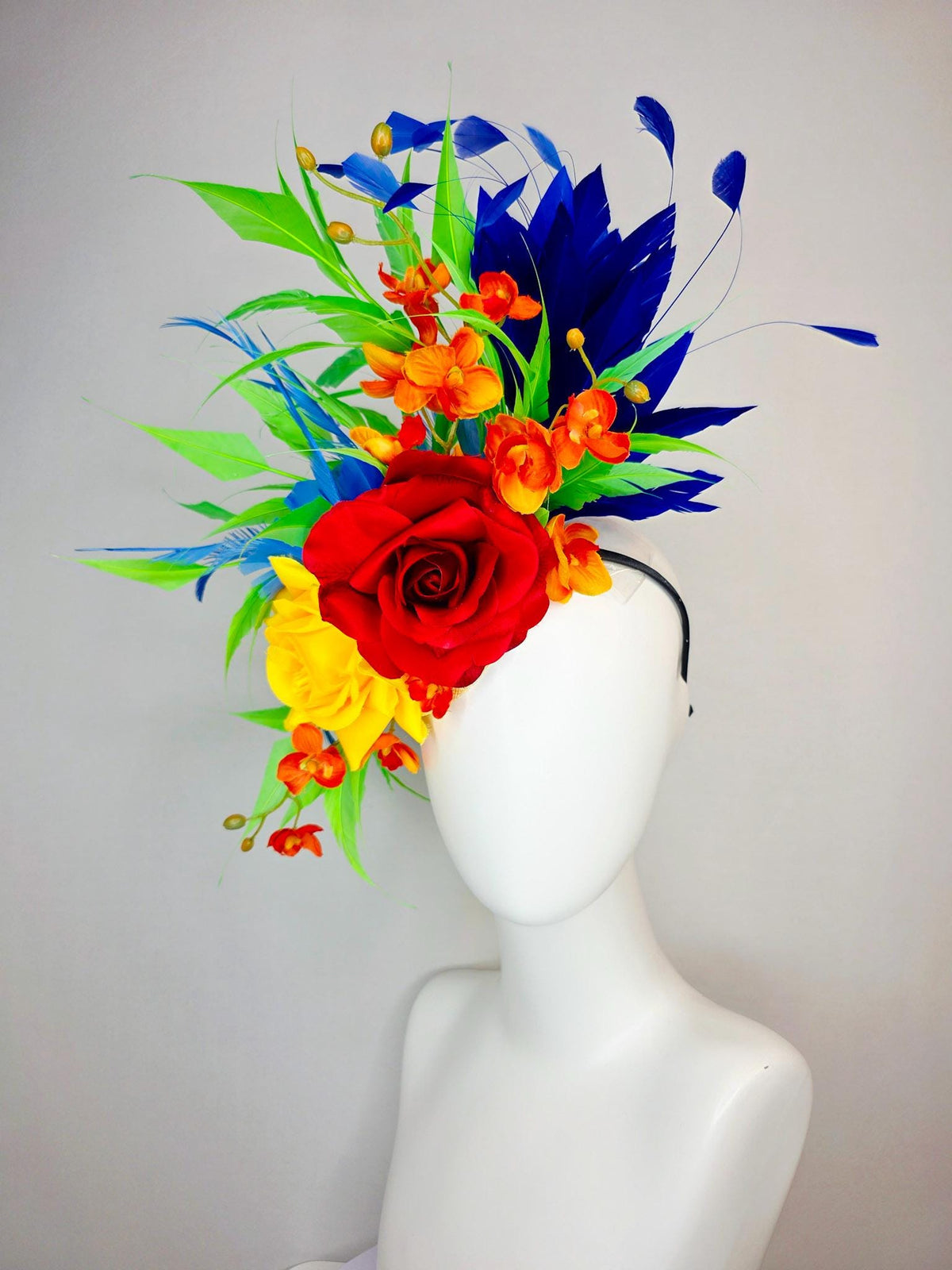 kentucky derby hat fascinator scarlet red and yellow satin roses orange red satin orchids cobalt royal blue lime green branching feathers
