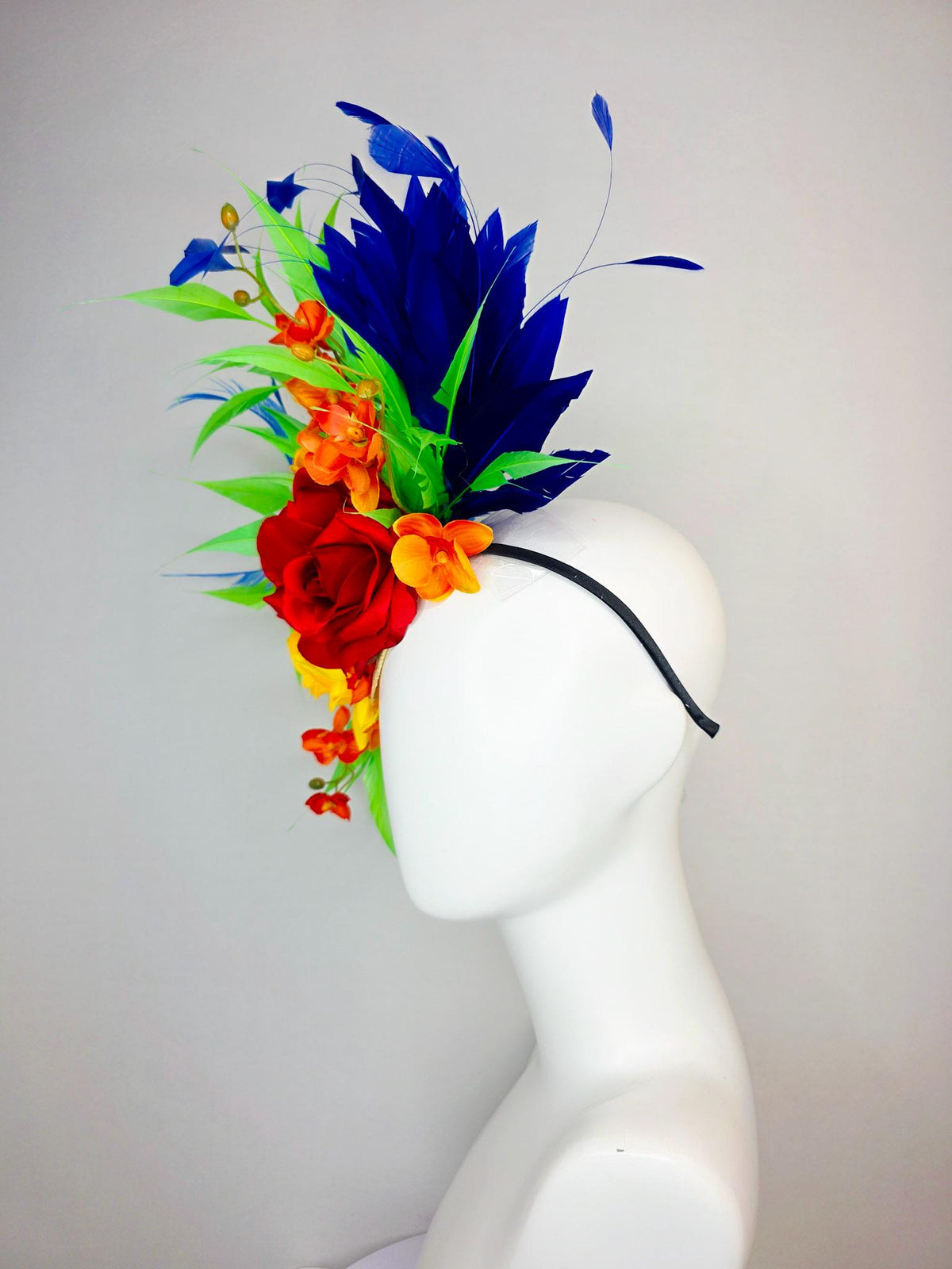 kentucky derby hat fascinator scarlet red and yellow satin roses orange red satin orchids cobalt royal blue lime green branching feathers
