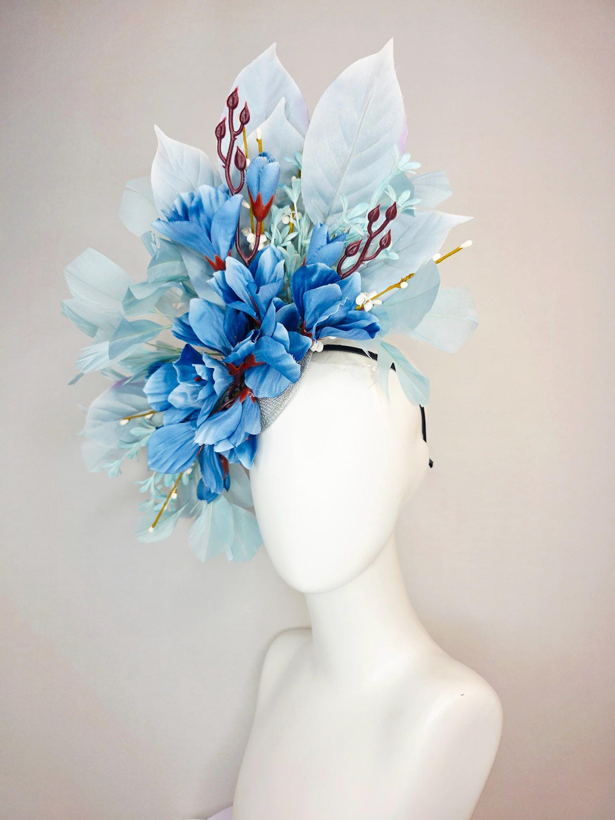 kentucky derby hat fascinator ombre royal blue satin flowers baby blue flower stems light blue satin leaves light blue branching feathers