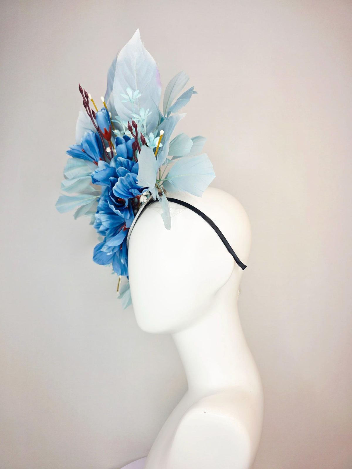 kentucky derby hat fascinator ombre royal blue satin flowers baby blue flower stems light blue satin leaves light blue branching feathers