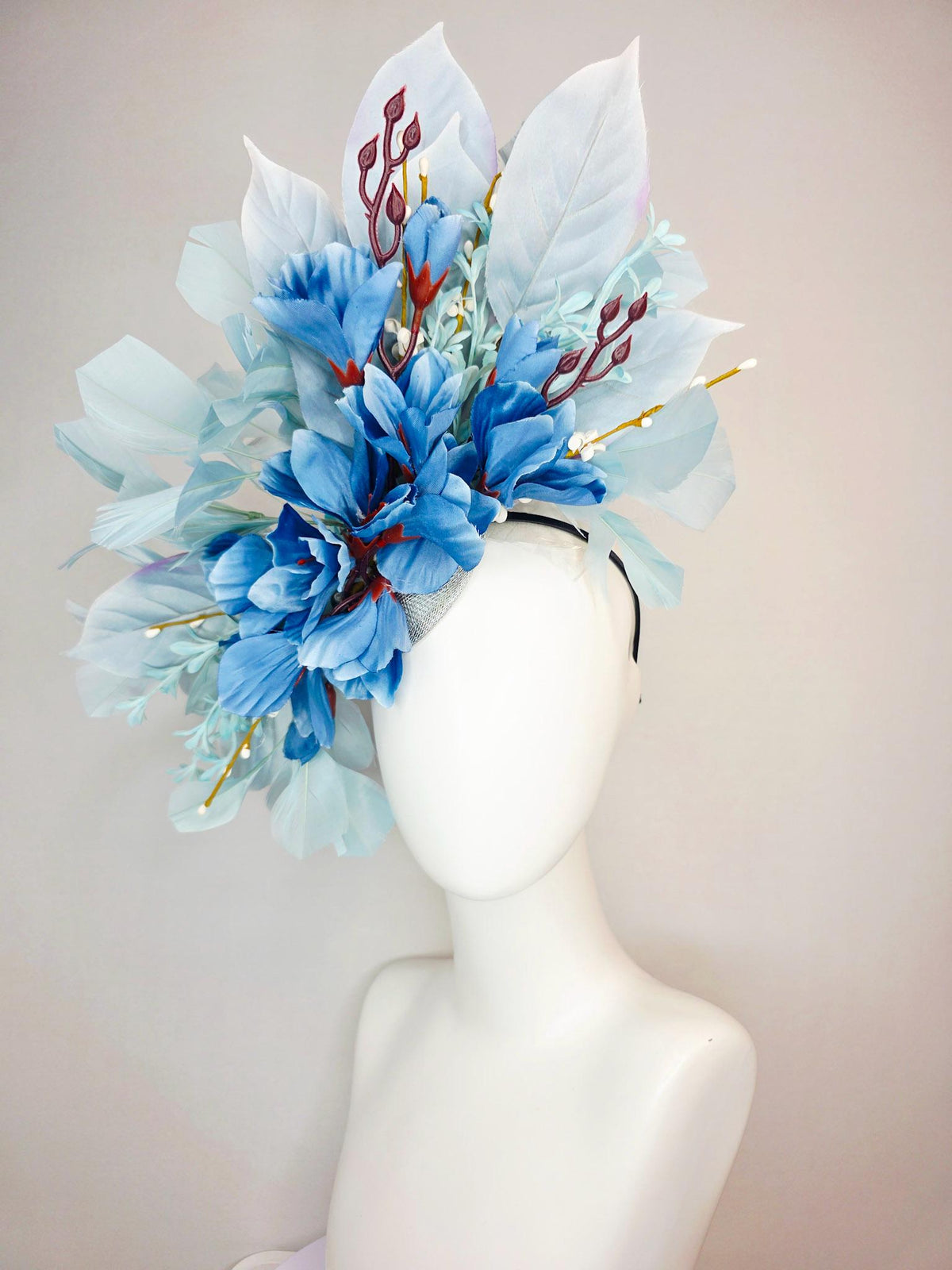kentucky derby hat fascinator ombre royal blue satin flowers baby blue flower stems light blue satin leaves light blue branching feathers