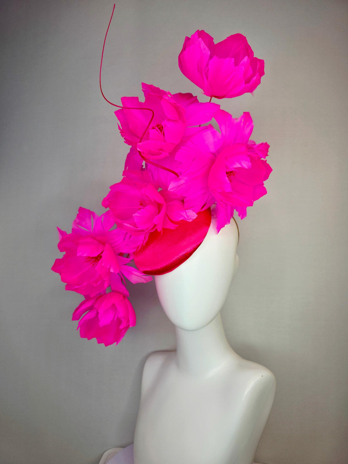 kentucky derby hat fascinator red satin with large fluffy bright fuchsia pink feather flowers and fuchsia pink feathers