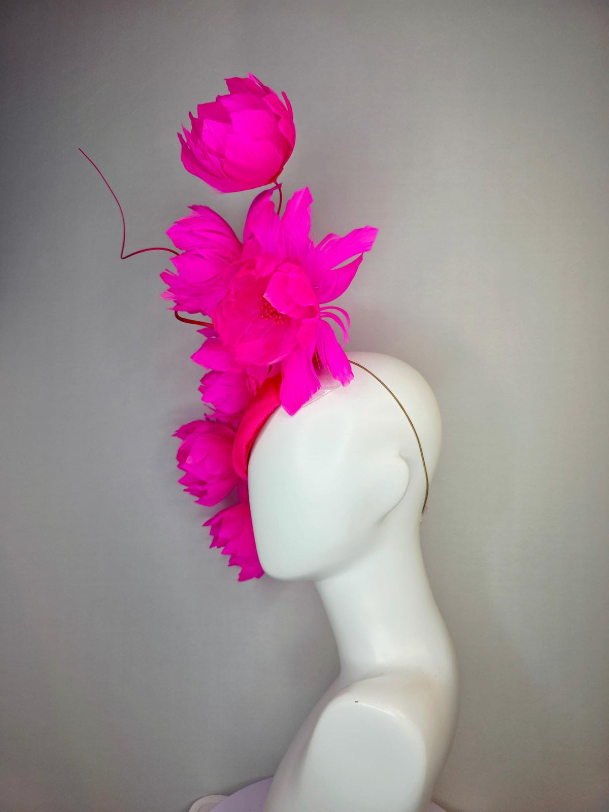 kentucky derby hat fascinator red satin with large fluffy bright fuchsia pink feather flowers and fuchsia pink feathers