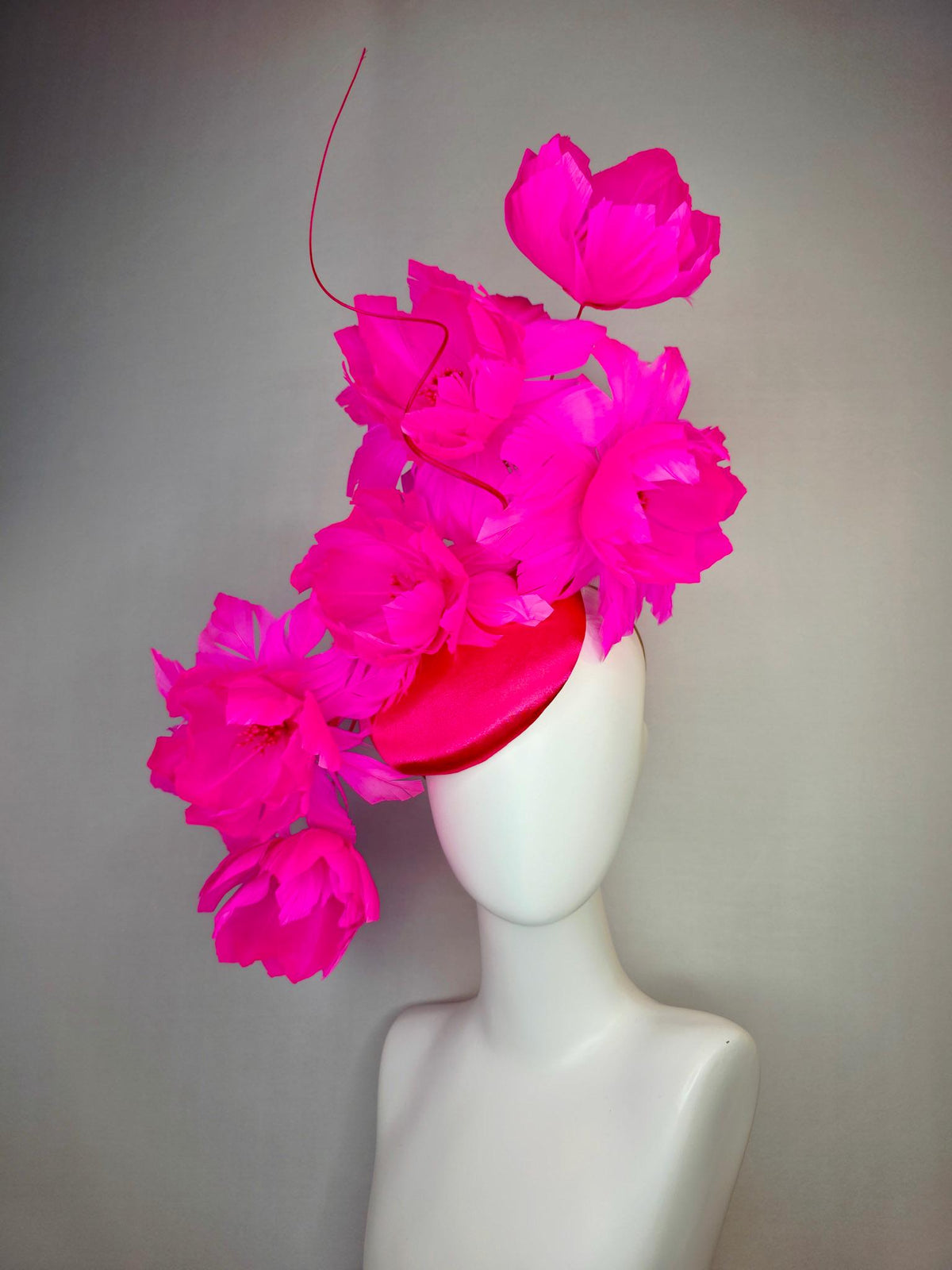 kentucky derby hat fascinator red satin with large fluffy bright fuchsia pink feather flowers and fuchsia pink feathers