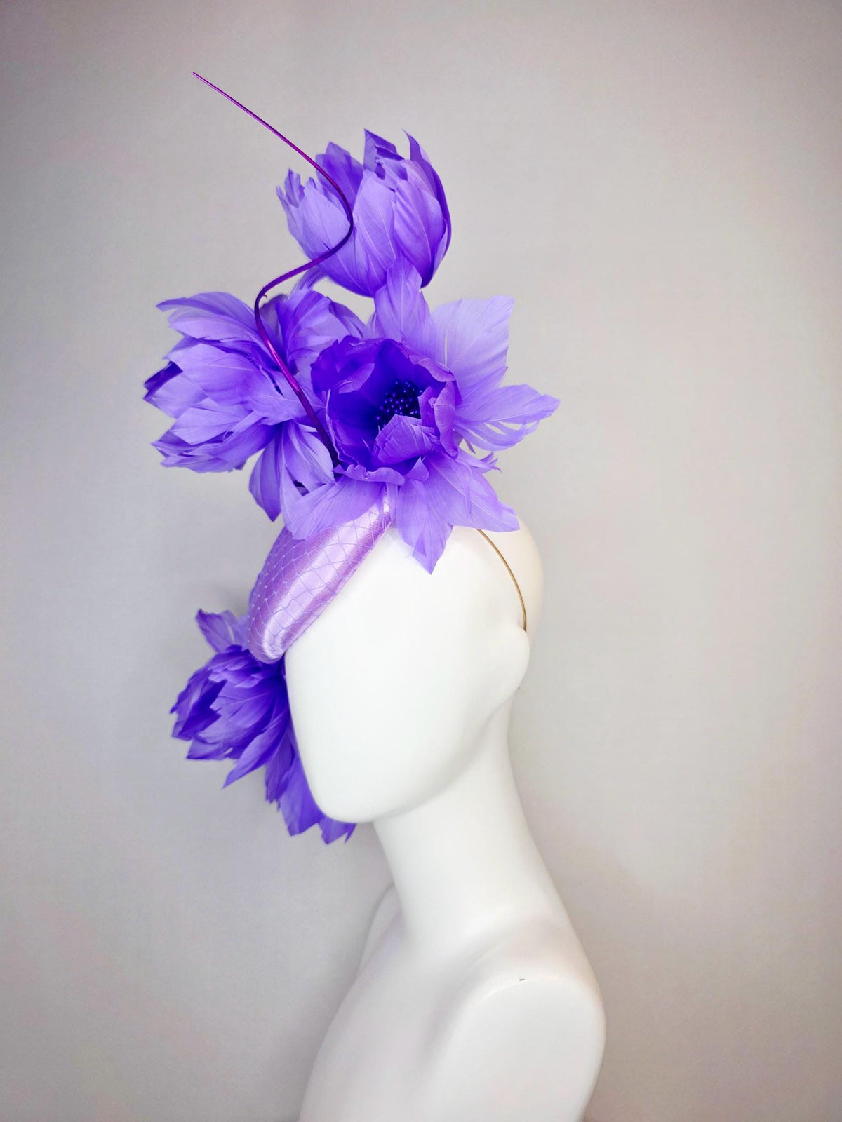 kentucky derby hat fascinator lavender purple satin with netting and large fluffy violet purple feather flowers and light purple feathers