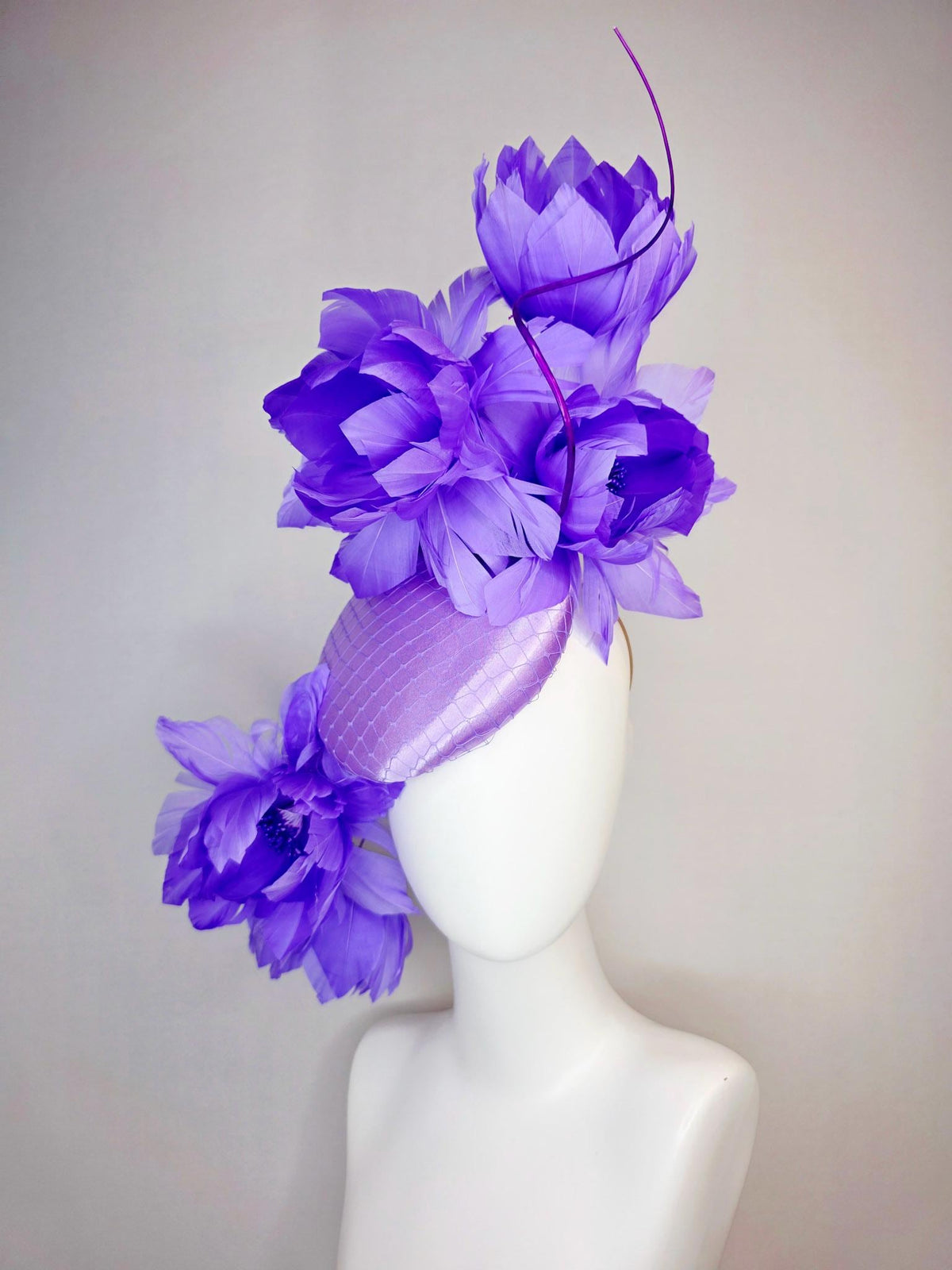 kentucky derby hat fascinator lavender purple satin with netting and large fluffy violet purple feather flowers and light purple feathers