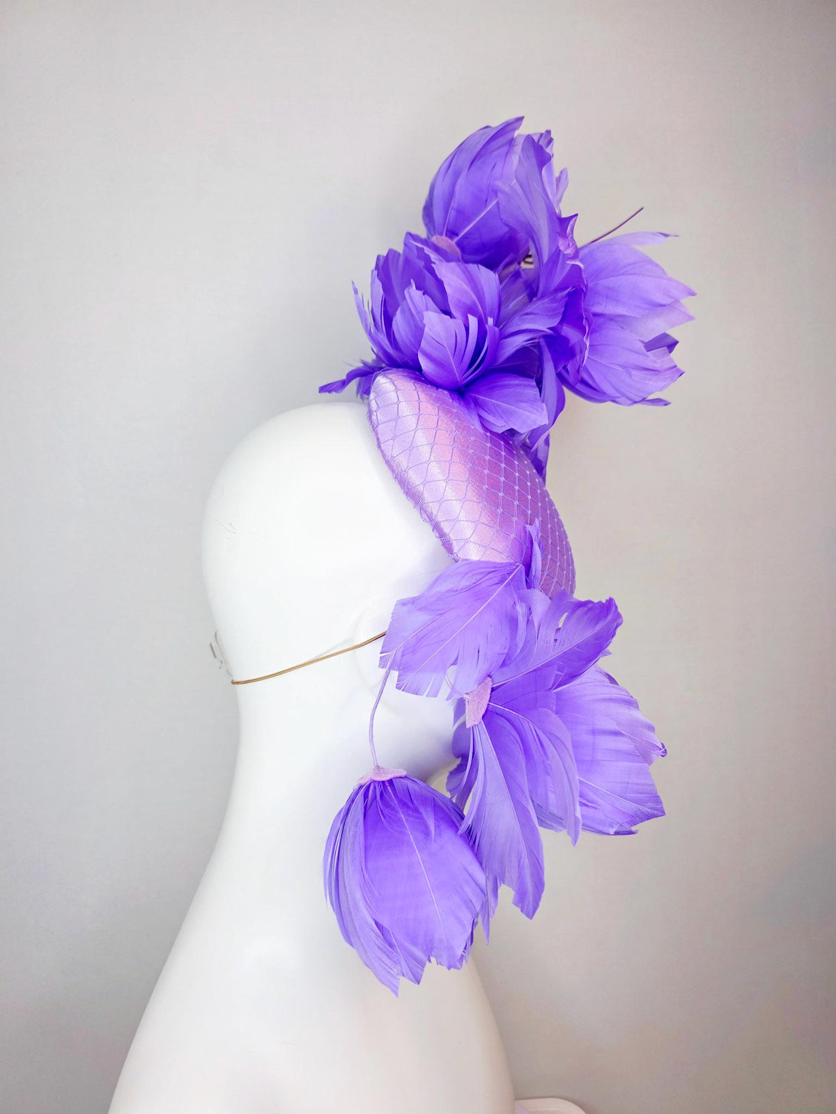 kentucky derby hat fascinator lavender purple satin with netting and large fluffy violet purple feather flowers and light purple feathers
