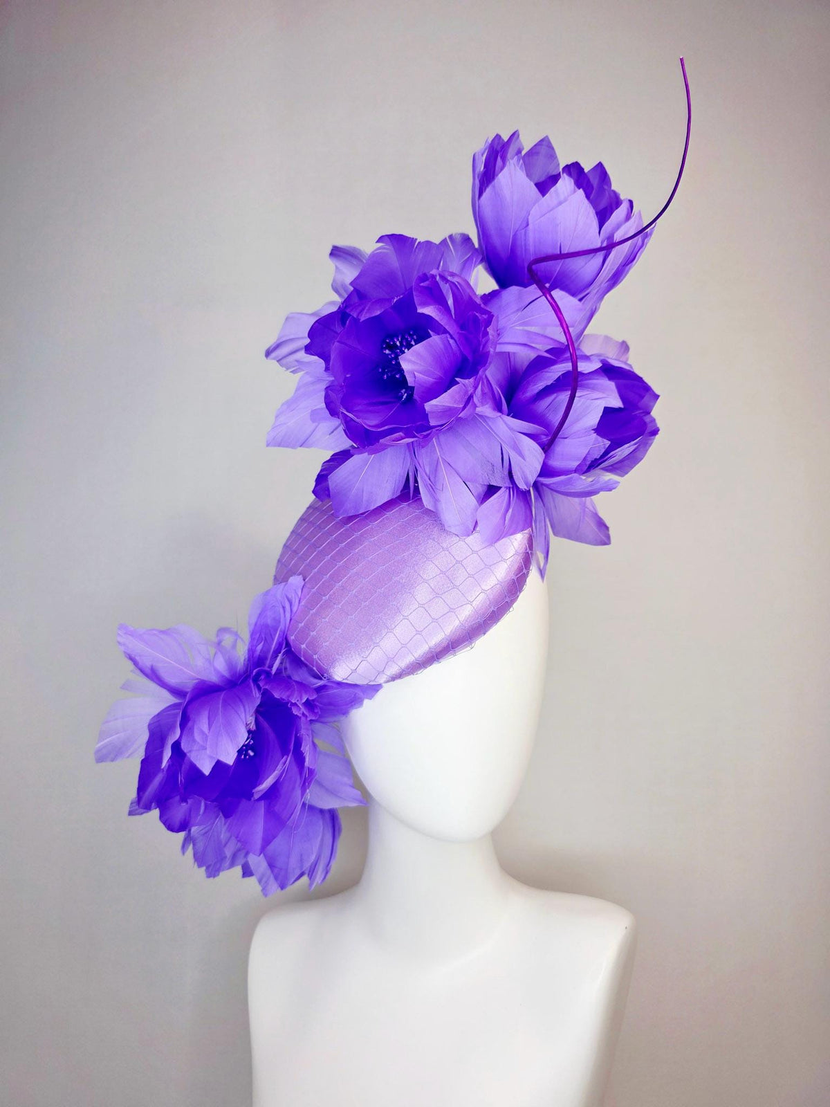 kentucky derby hat fascinator lavender purple satin with netting and large fluffy violet purple feather flowers and light purple feathers