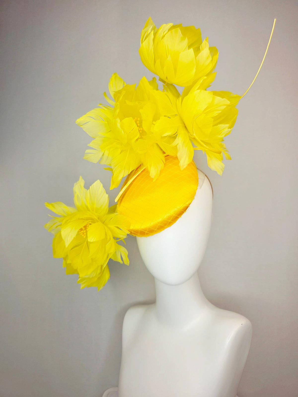 kentucky derby hat fascinator gold yellow satin with netting and large fluffy yellow feather flowers and yellow feathers