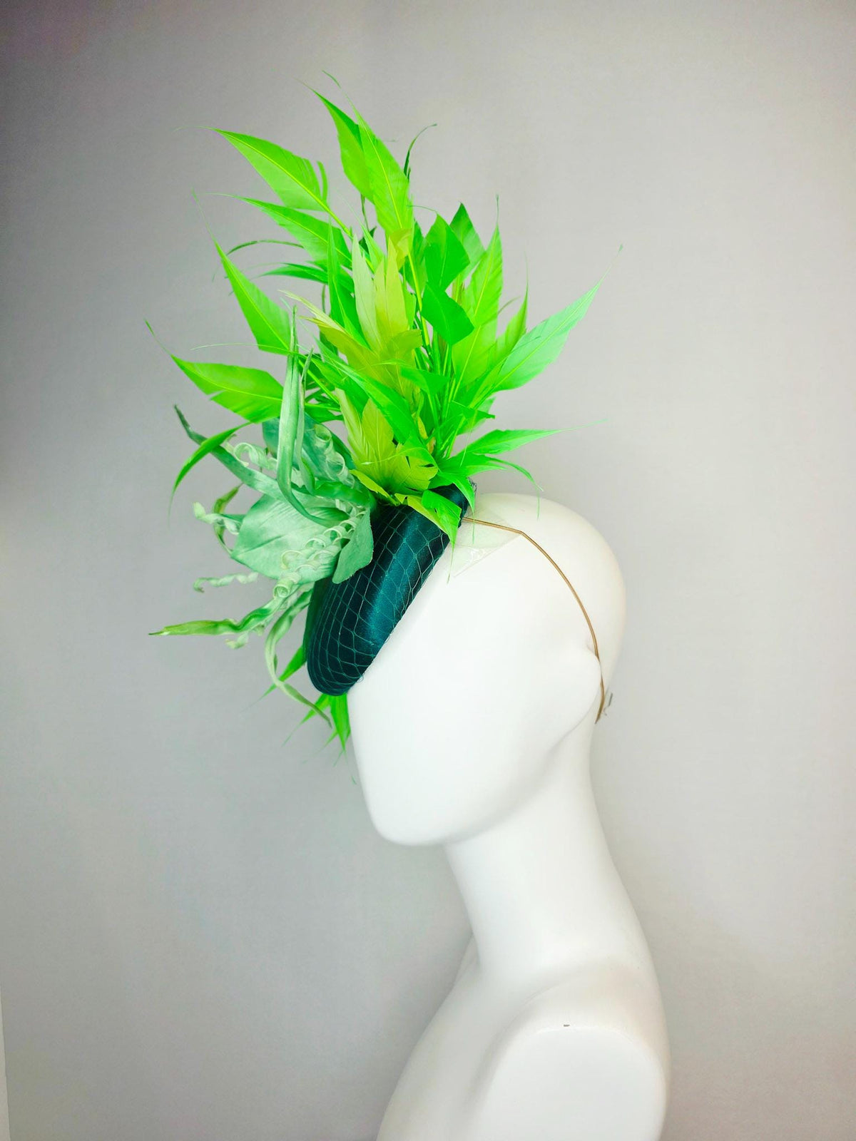 kentucky derby hat fascinator emerald green satin with netting light green satin flower with curls yellow lime green branching feathers
