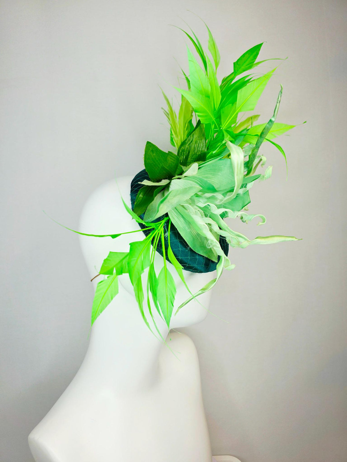 kentucky derby hat fascinator emerald green satin with netting light green satin flower with curls yellow lime green branching feathers