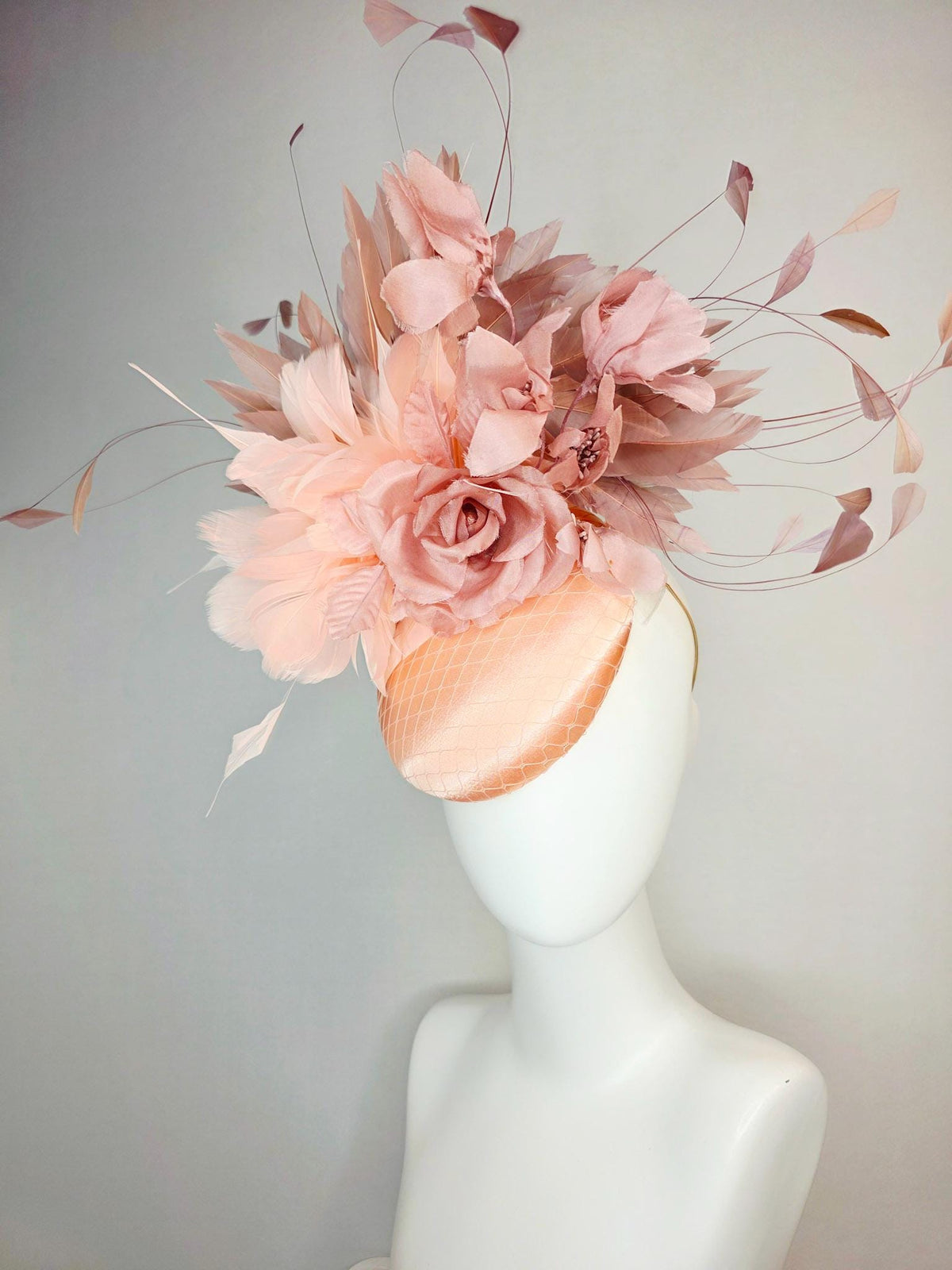 kentucky derby hat fascinator champagne pink peach satin with netting dusty pink organza roses baby pink and mauve dusty fluffy feathers