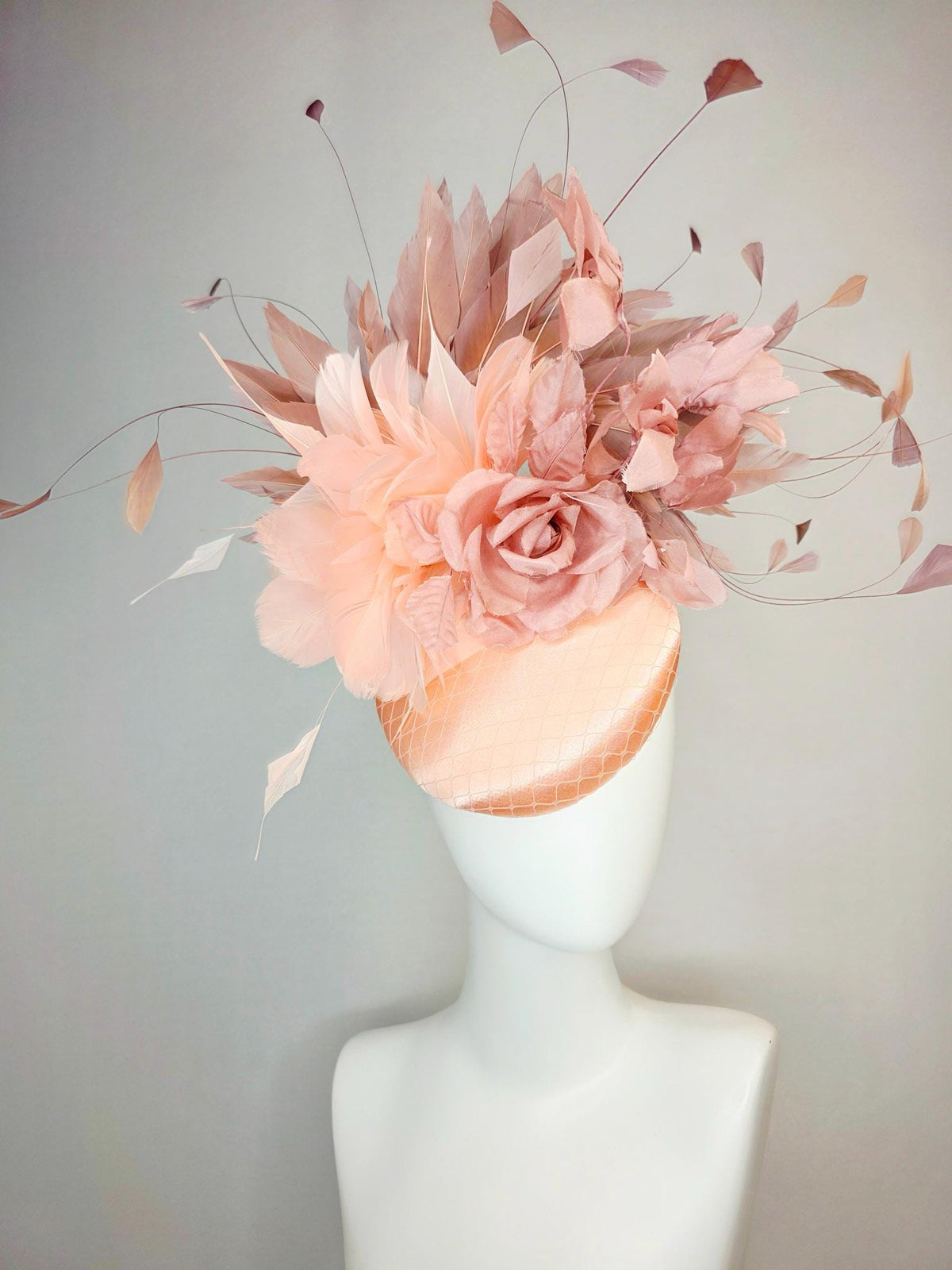 kentucky derby hat fascinator champagne pink peach satin with netting dusty pink organza roses baby pink and mauve dusty fluffy feathers