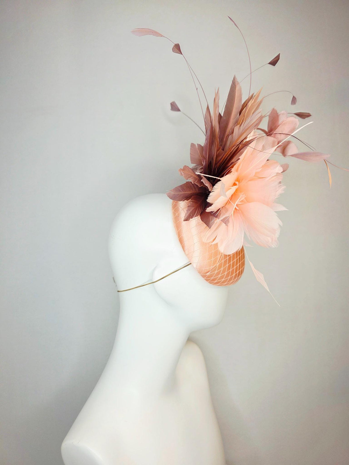 kentucky derby hat fascinator champagne pink peach satin with netting dusty pink organza roses baby pink and mauve dusty fluffy feathers