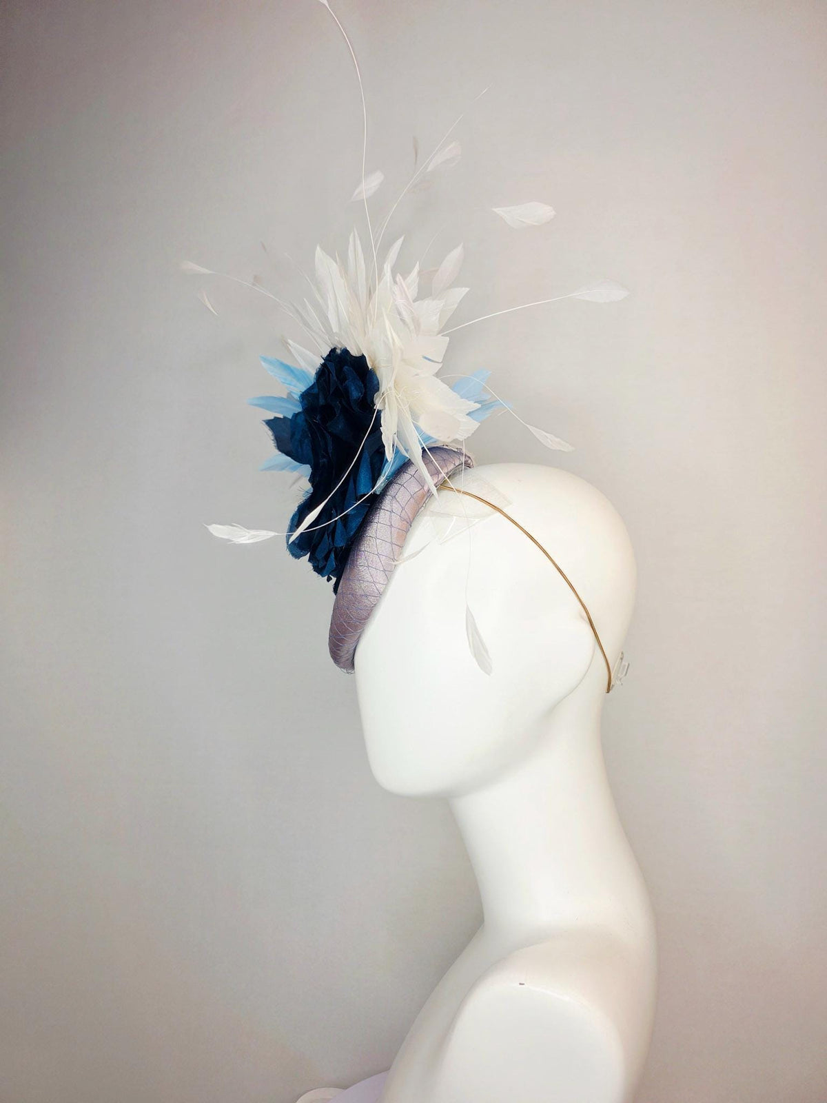 kentucky derby hat fascinator silver gray satin with netting large navy blue organza rose flower with sky blue and white branching feathers