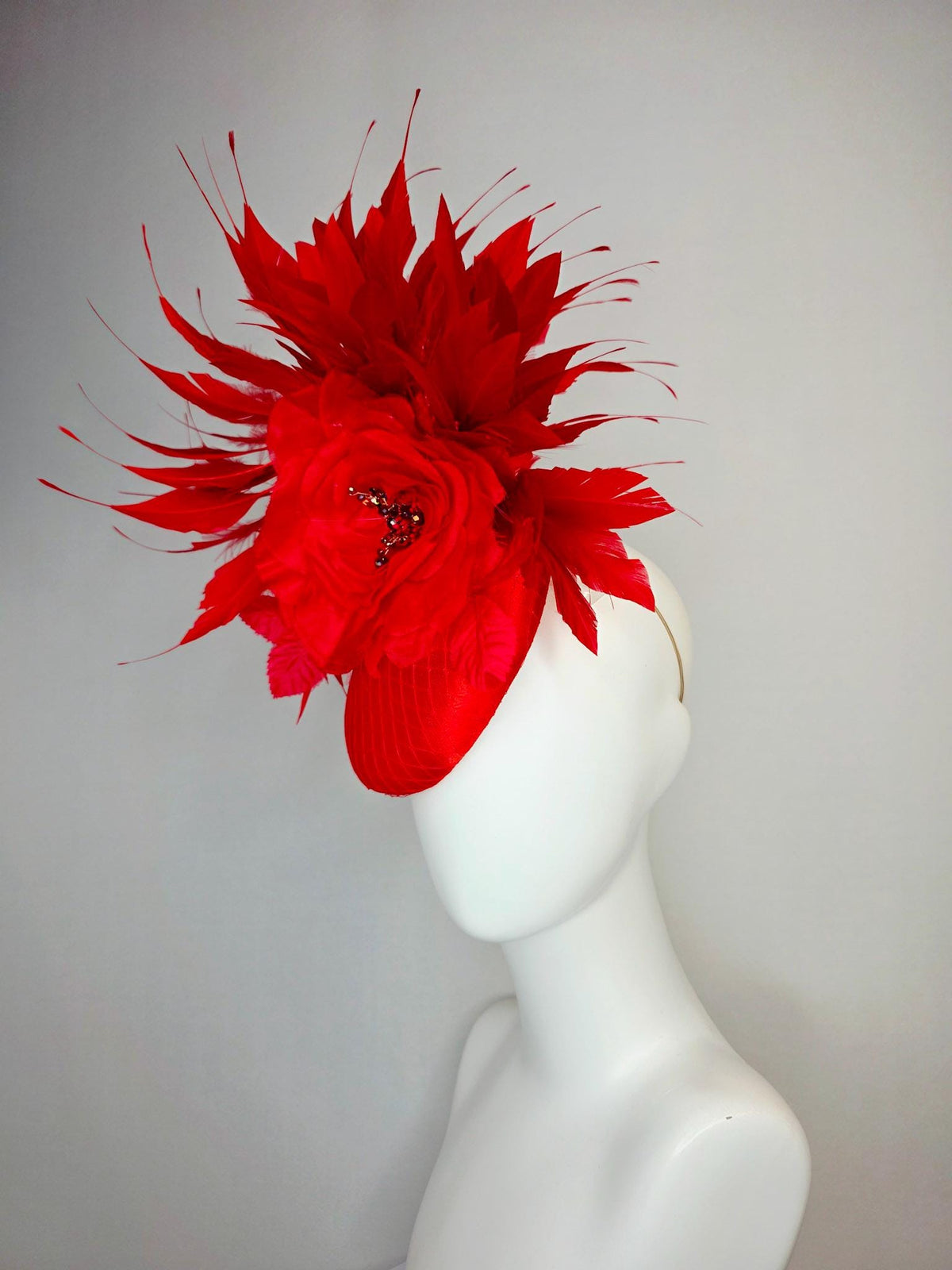 kentucky derby hat fascinator bright red satin with netting large red organza rose flower with red leaves and scarlet red branching feathers