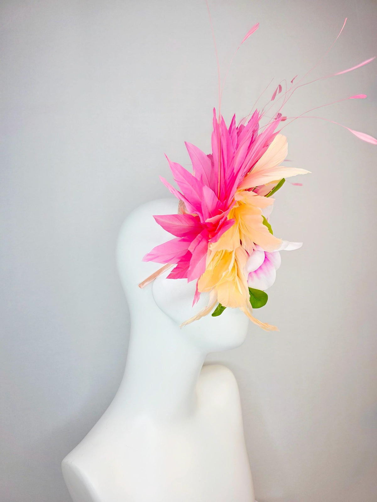 kentucky derby hat fascinator light pink satin with netting pink white satin flowers green leaves cream beige and hot pink fluffy feathers