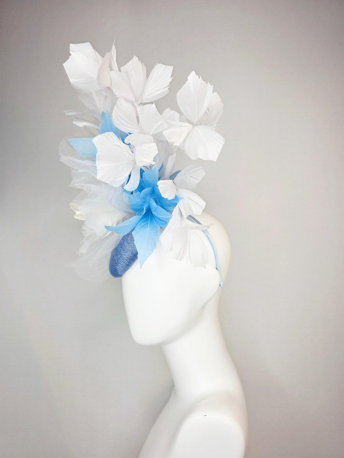 kentucky derby hat fascinator denim blue sinamay with large ivory white organza rose flower sky blue and white branching feathers